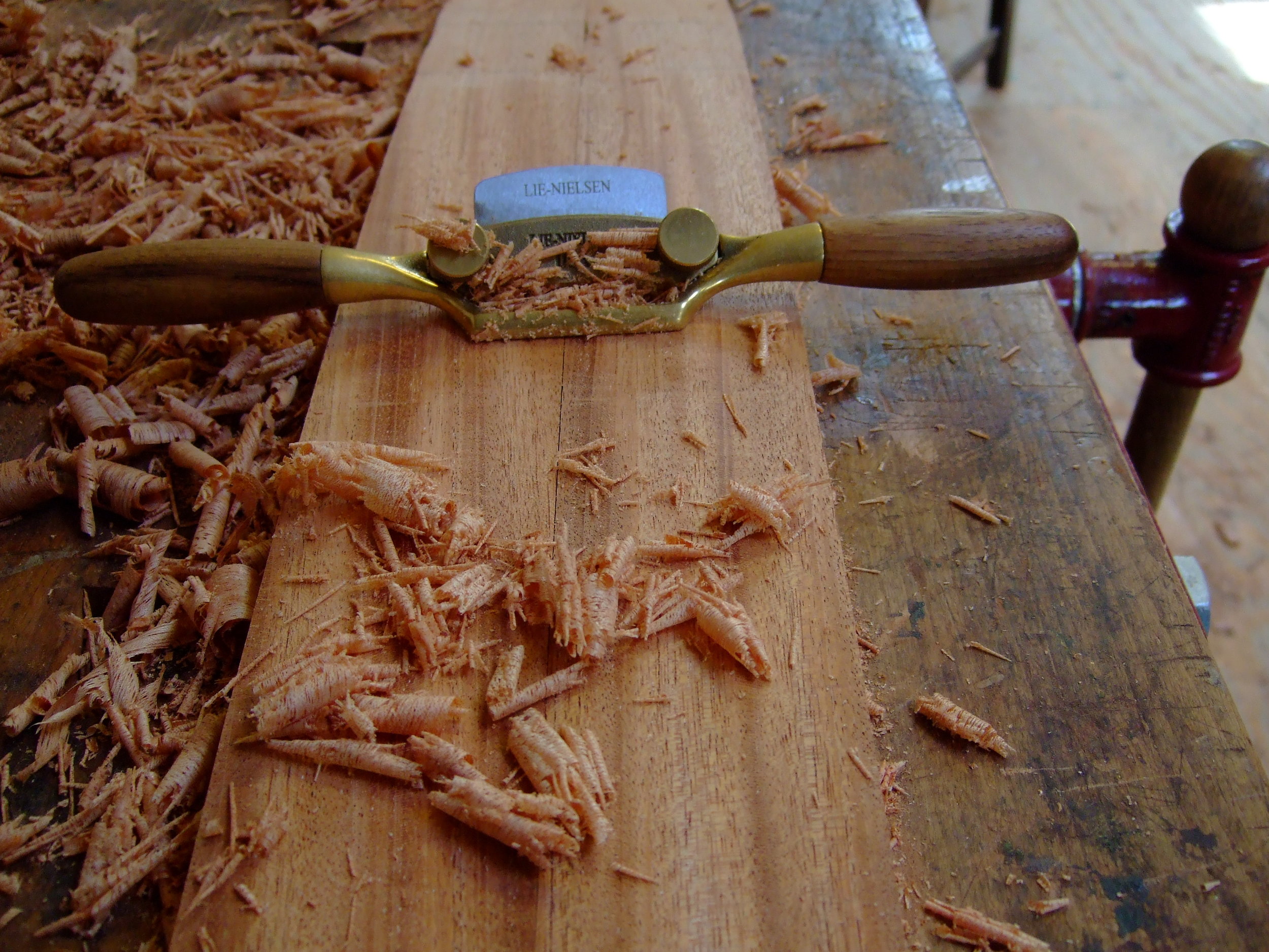 Fairing the rear posts with a spokeshave.