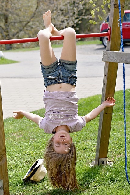 Girl hanging upside down - grat 640.jpg