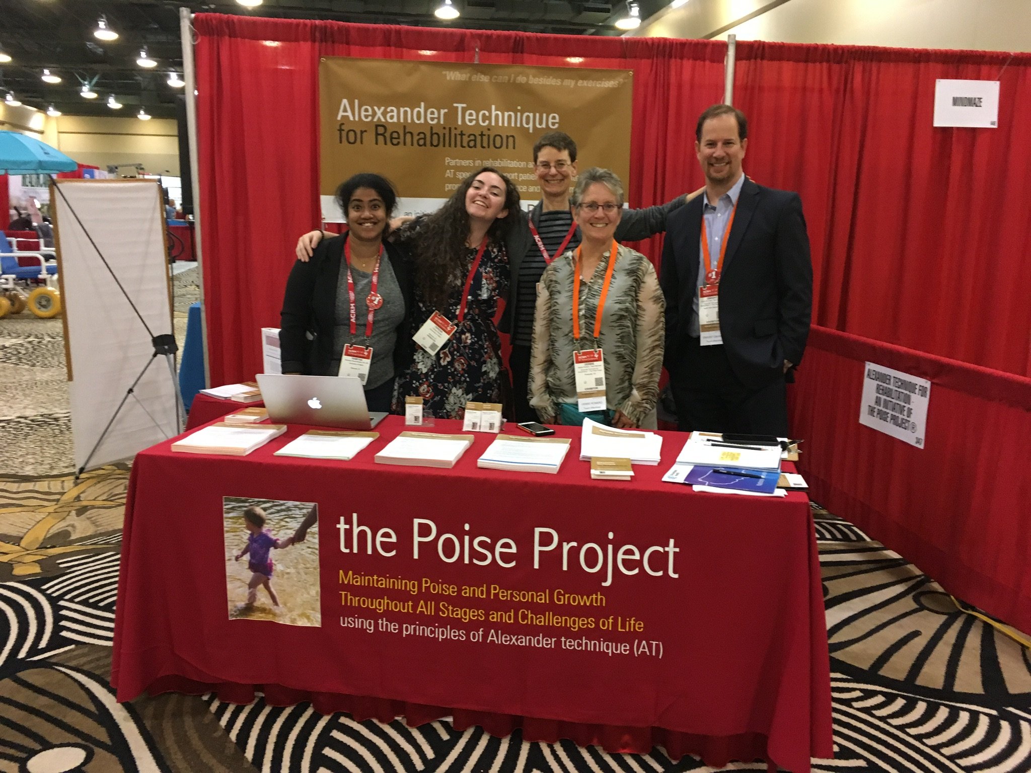 ACRM booth with Team Poise.jpg