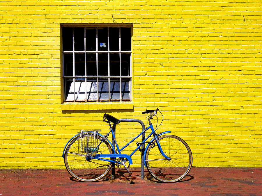 yellow-wall-and-blue-bicycle-steven-ainsworth.jpg