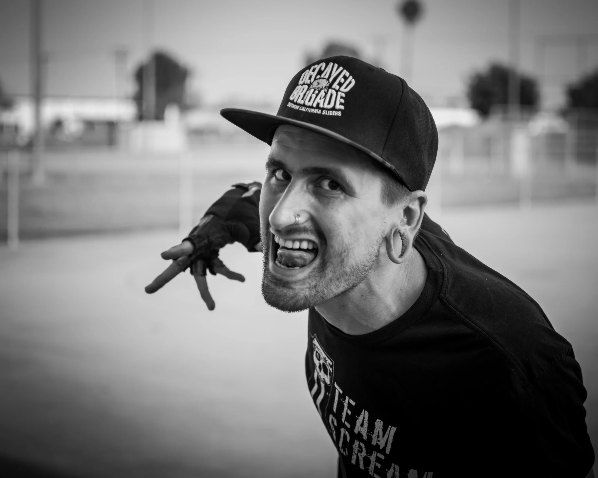 Michael "Eerie" Stewart Years with the Brigade: 4 Day Job: Assistant Manager Visual Design at Pac-Sun Michael's first haunted attraction was Haunted Hollywood Sports. He has been at Knott's Scary Farm for 3 years all of which have been spent in Ghost Town. When sliding, his mind is clear and he's focused on his tricks, judging his speed and stopping ability. He's fully immersed and his character comes to life. Michael spent 10 years as a gymnast. As a kid he loved clowns and the fear clowns bring. Michael continually wants to push the standards, go big but stay humble. Advice for those wanting to slide: Have fun, be safe and learn the basics. Holds his dad as a big inspiration. 