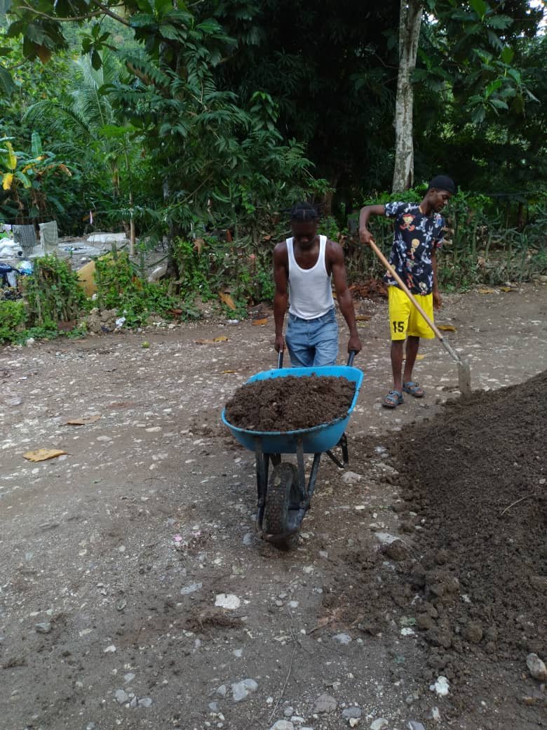 moving the soil delievery in to the tree nursery.JPG