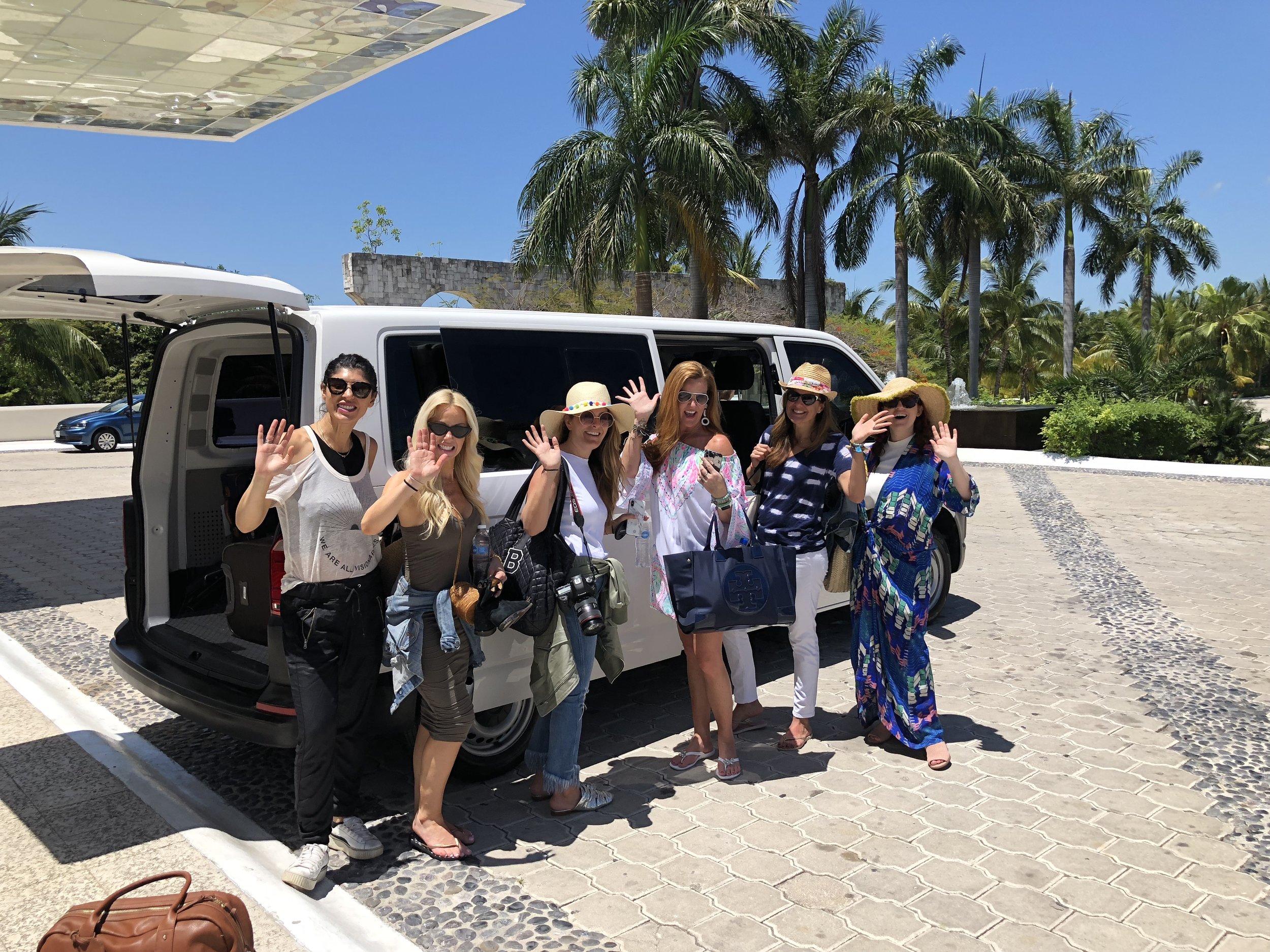 group waving goodbye.jpeg