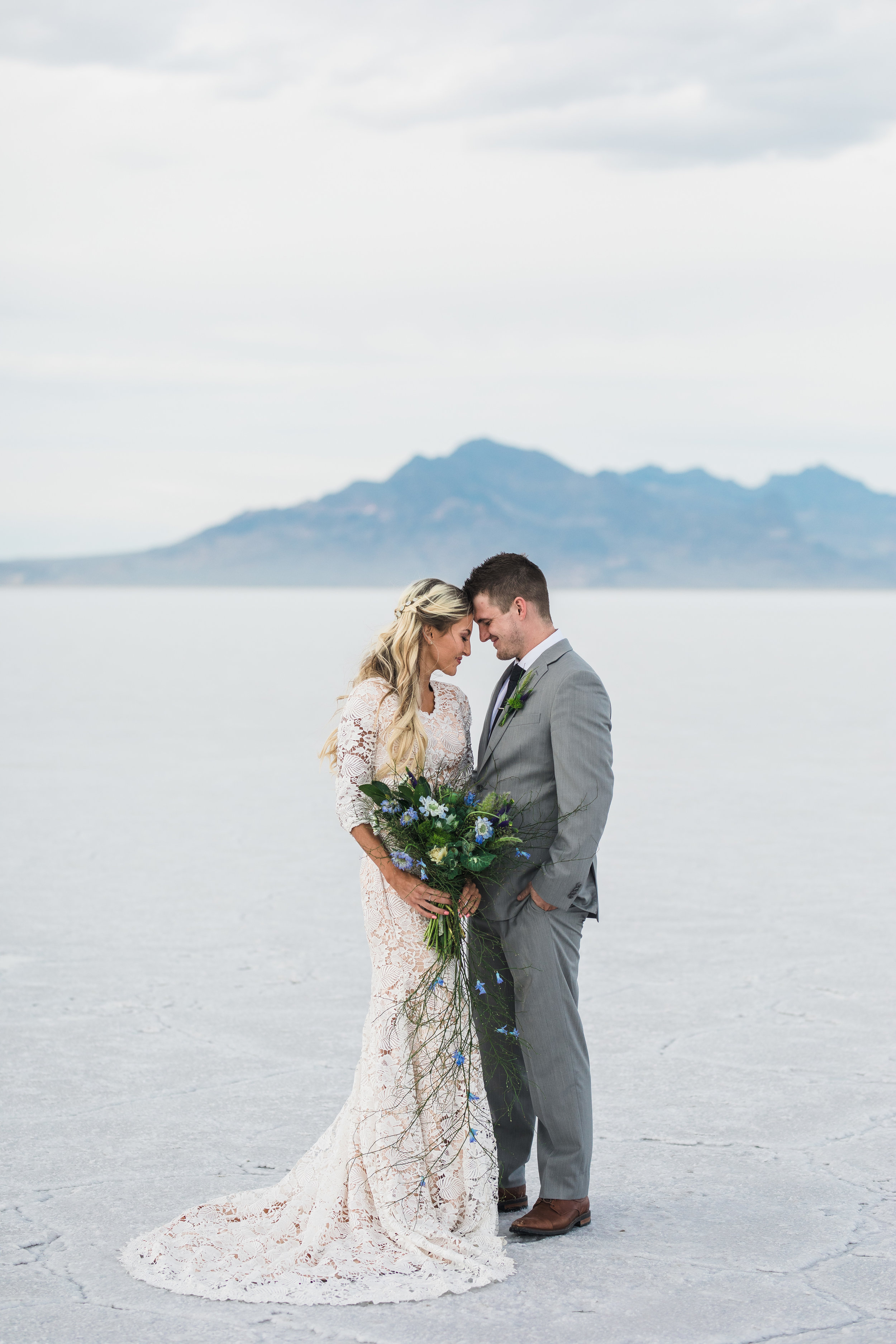 Elizabeth Cooper Design modest wedding dress L floral studio bouquet Utah salt flats bridals