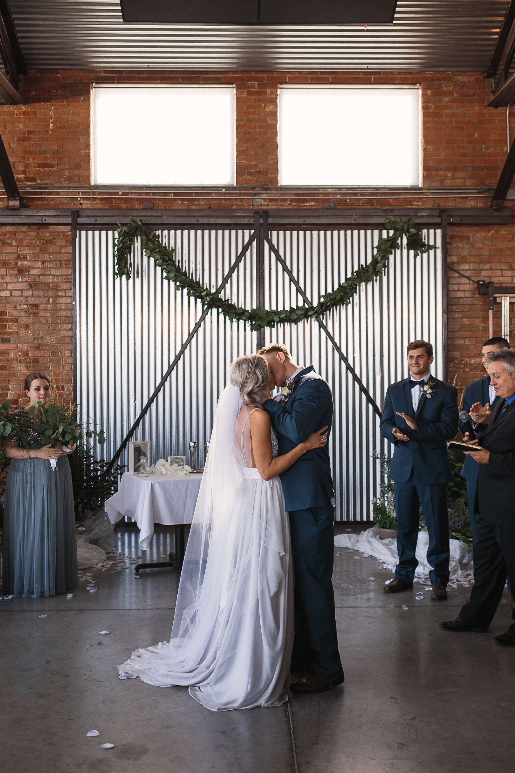 Bride and Groom First kiss after wedding ceremony