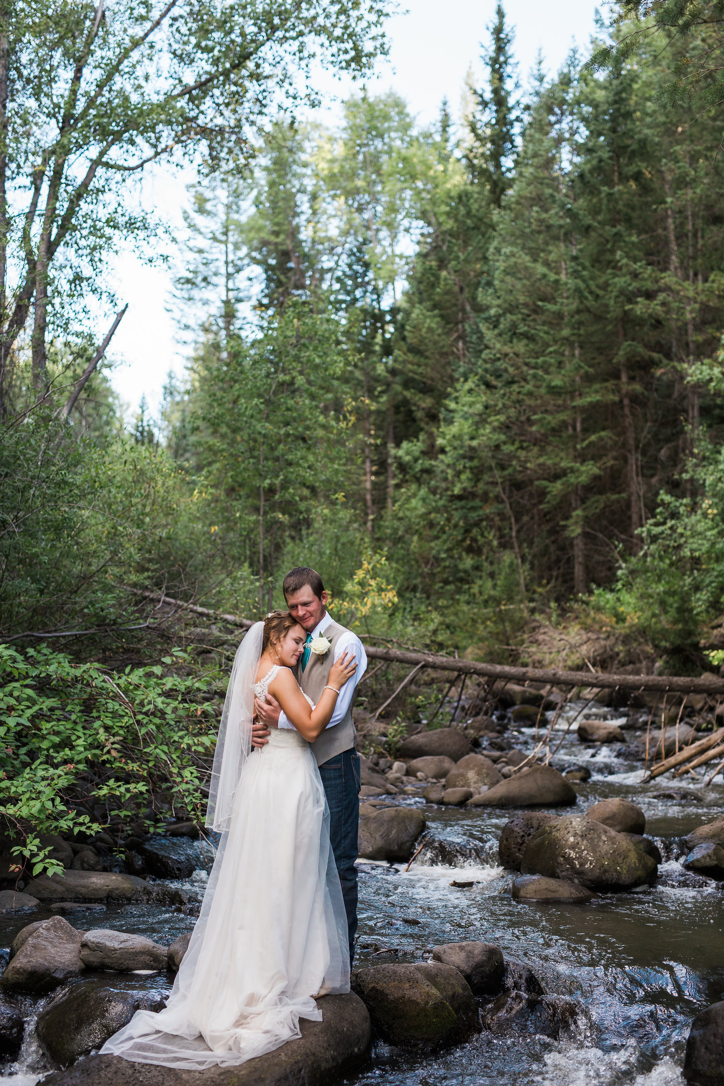 Colorado Mountain River Bride Groom Portrait