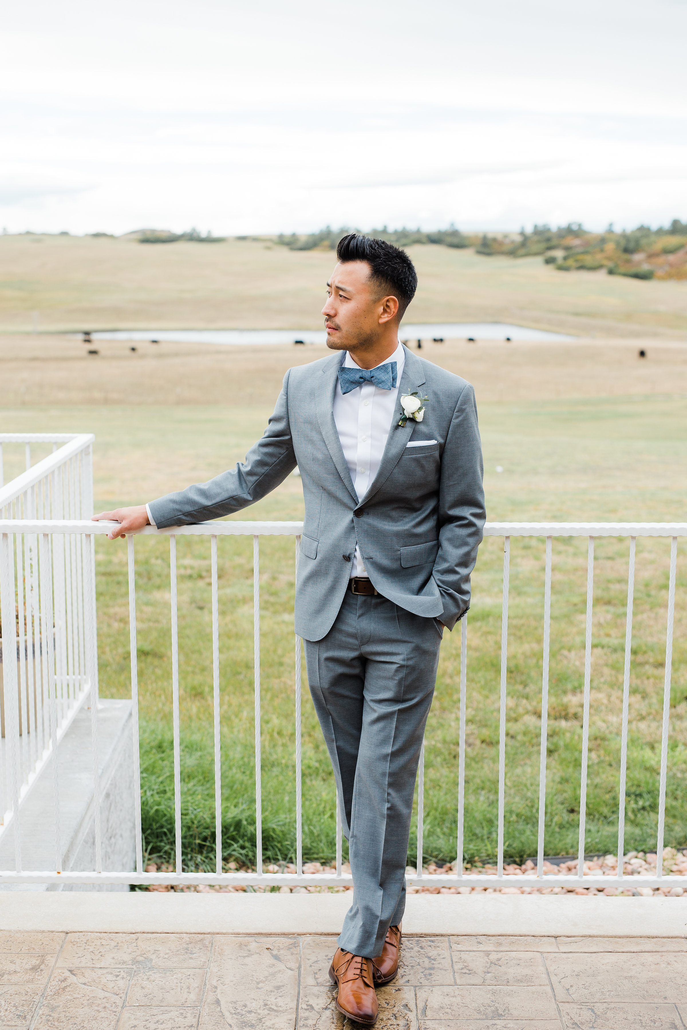 Classy asian groom portrait Flying Horse Ranch wedding