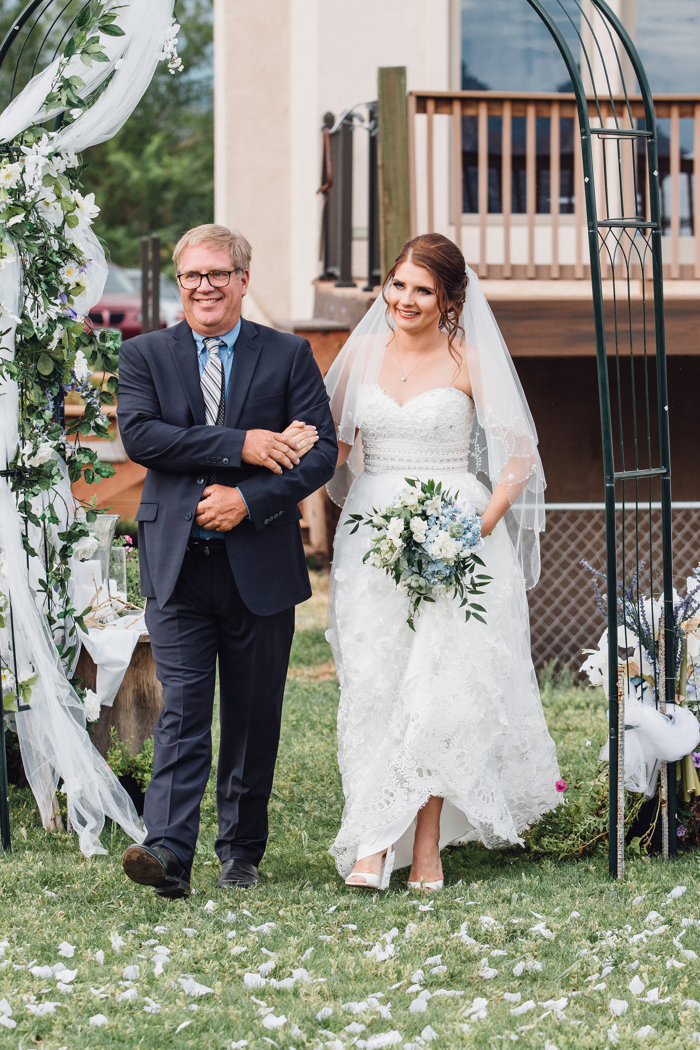 Colorado Bride walking down the isle with her father