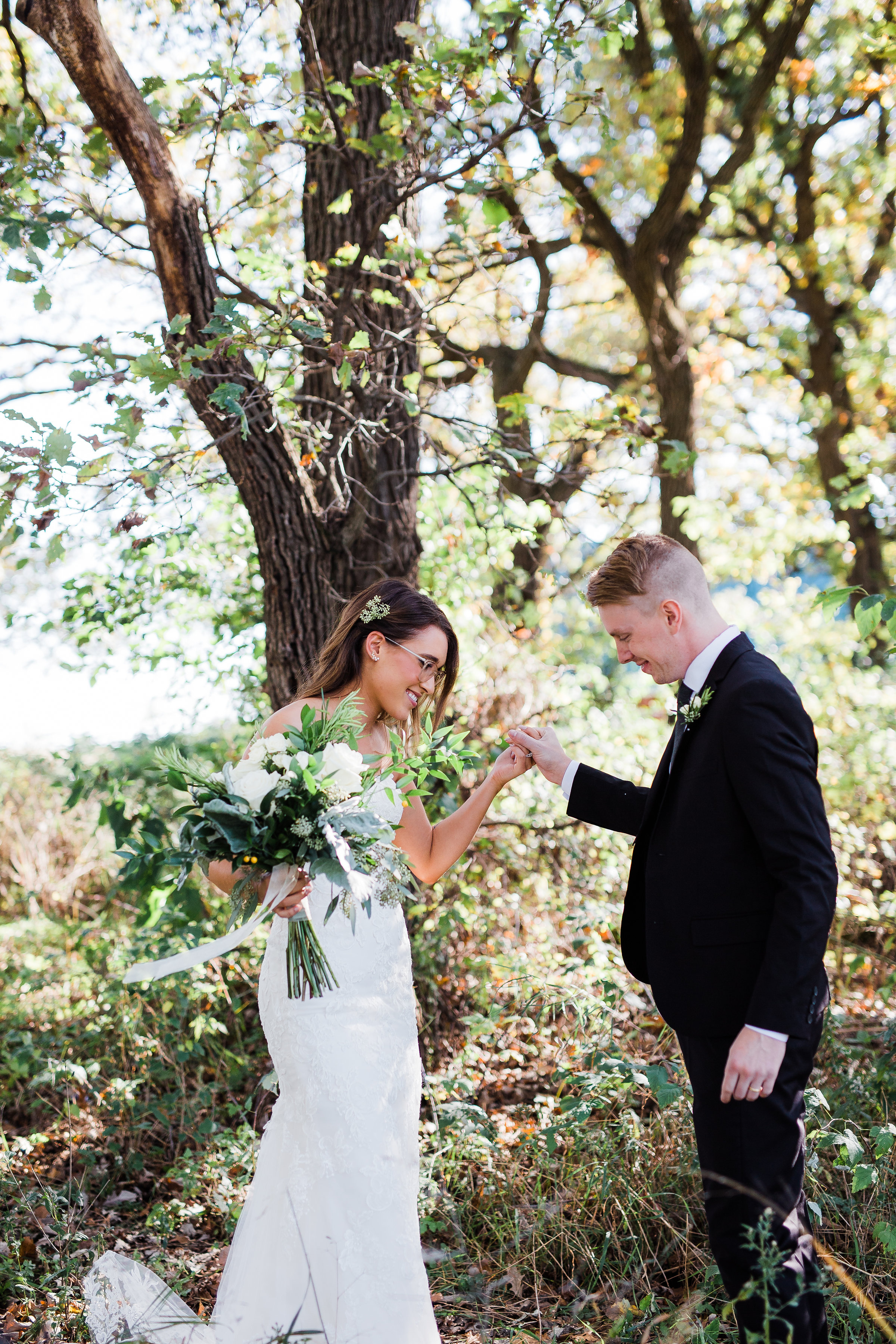 Groom sees his bride for the first time on their wedding day near the Twin Cities