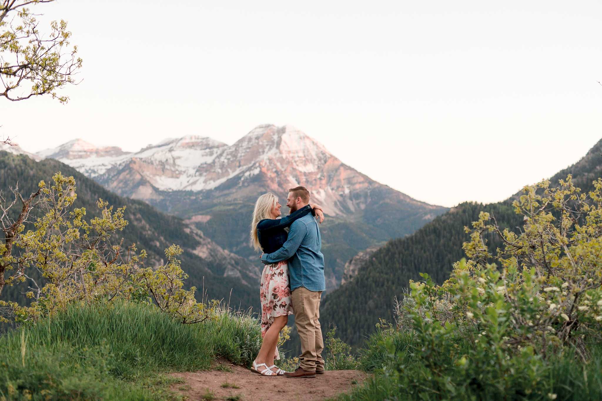 Couple pose for engagement pictures at Silver Lake, Utah