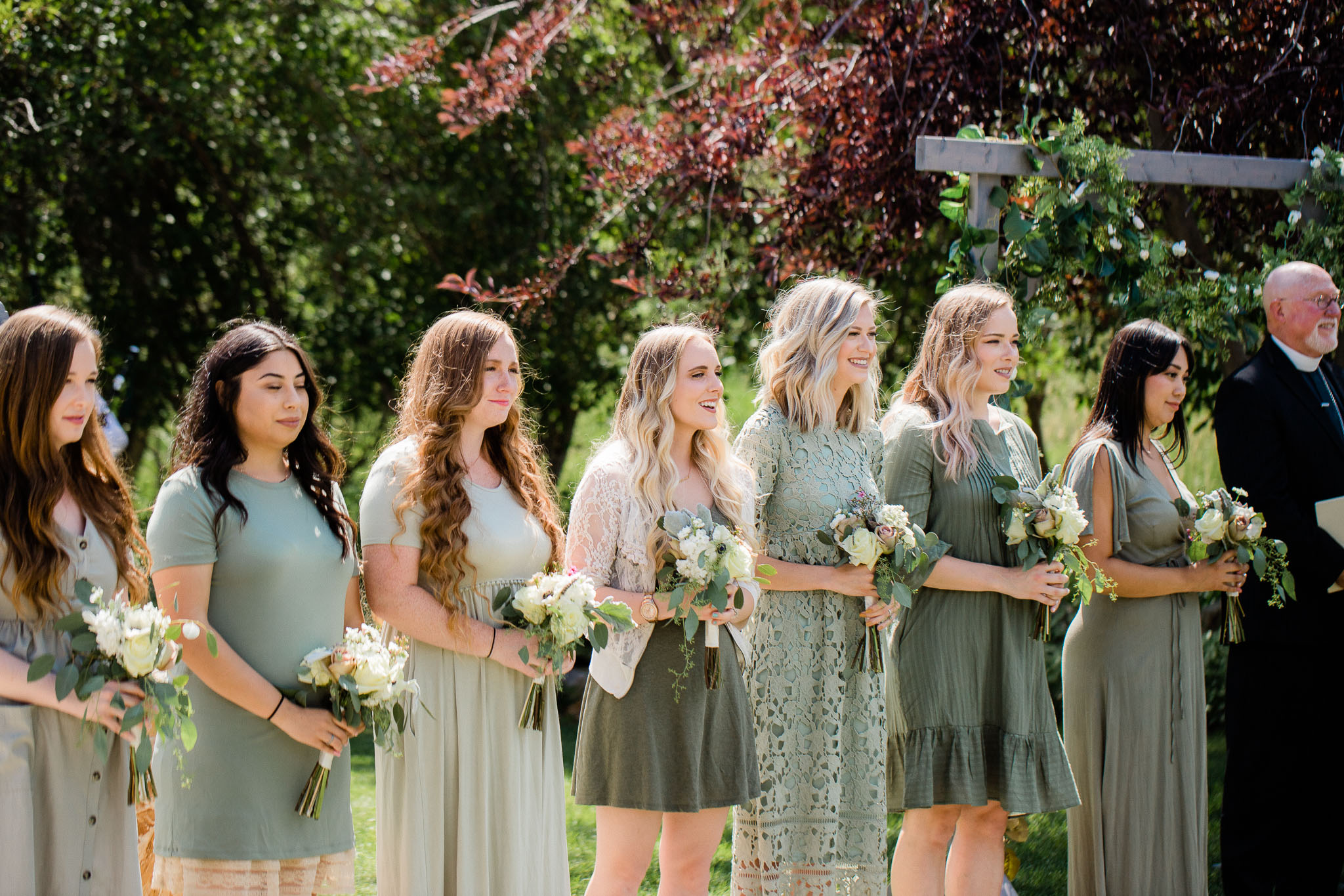 Bridesmaids during wedding ceremony at cabin in Utah Mountains