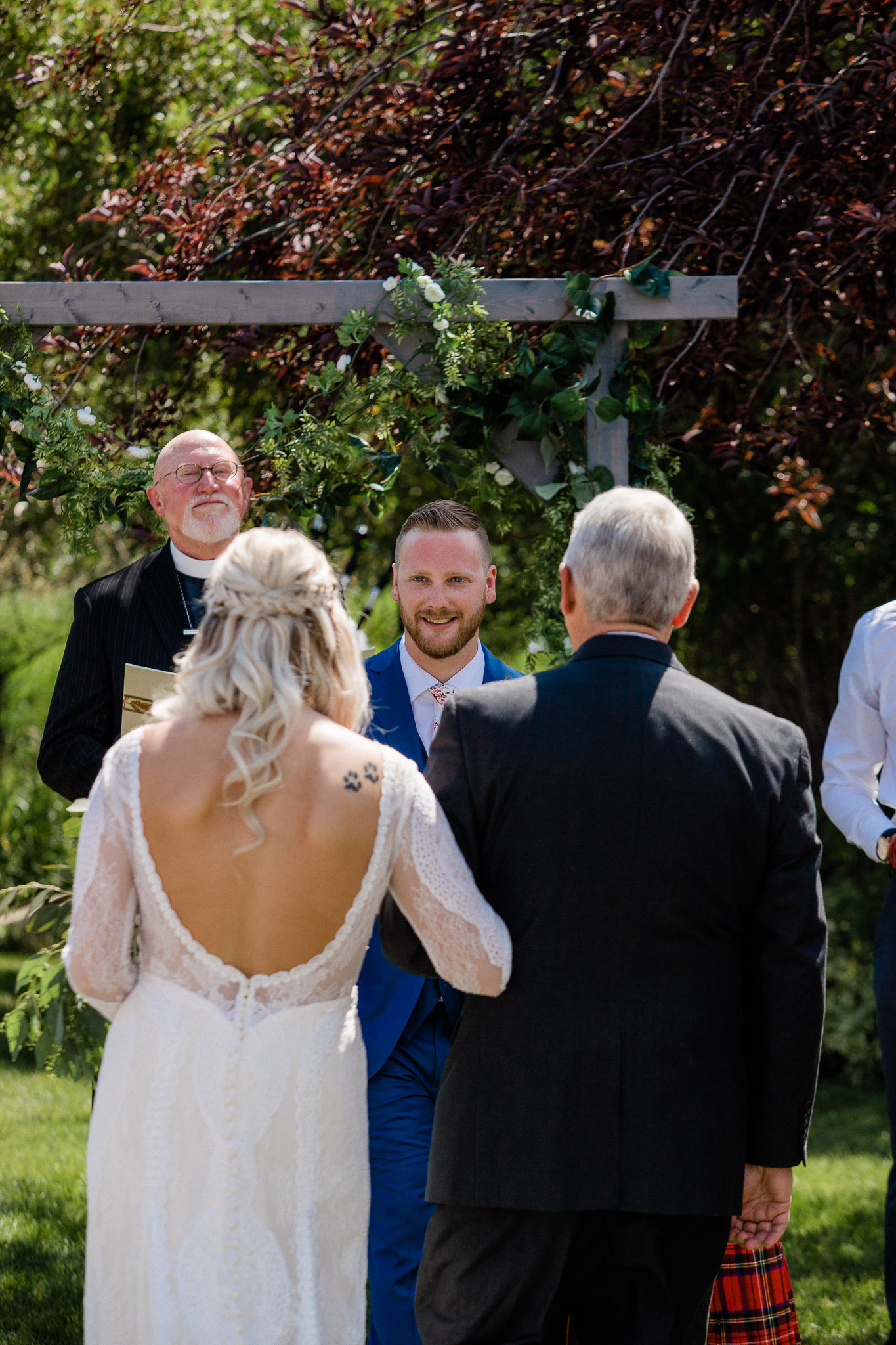 Bride and Groom during wedding ceremony at cabin in Utah Mountains
