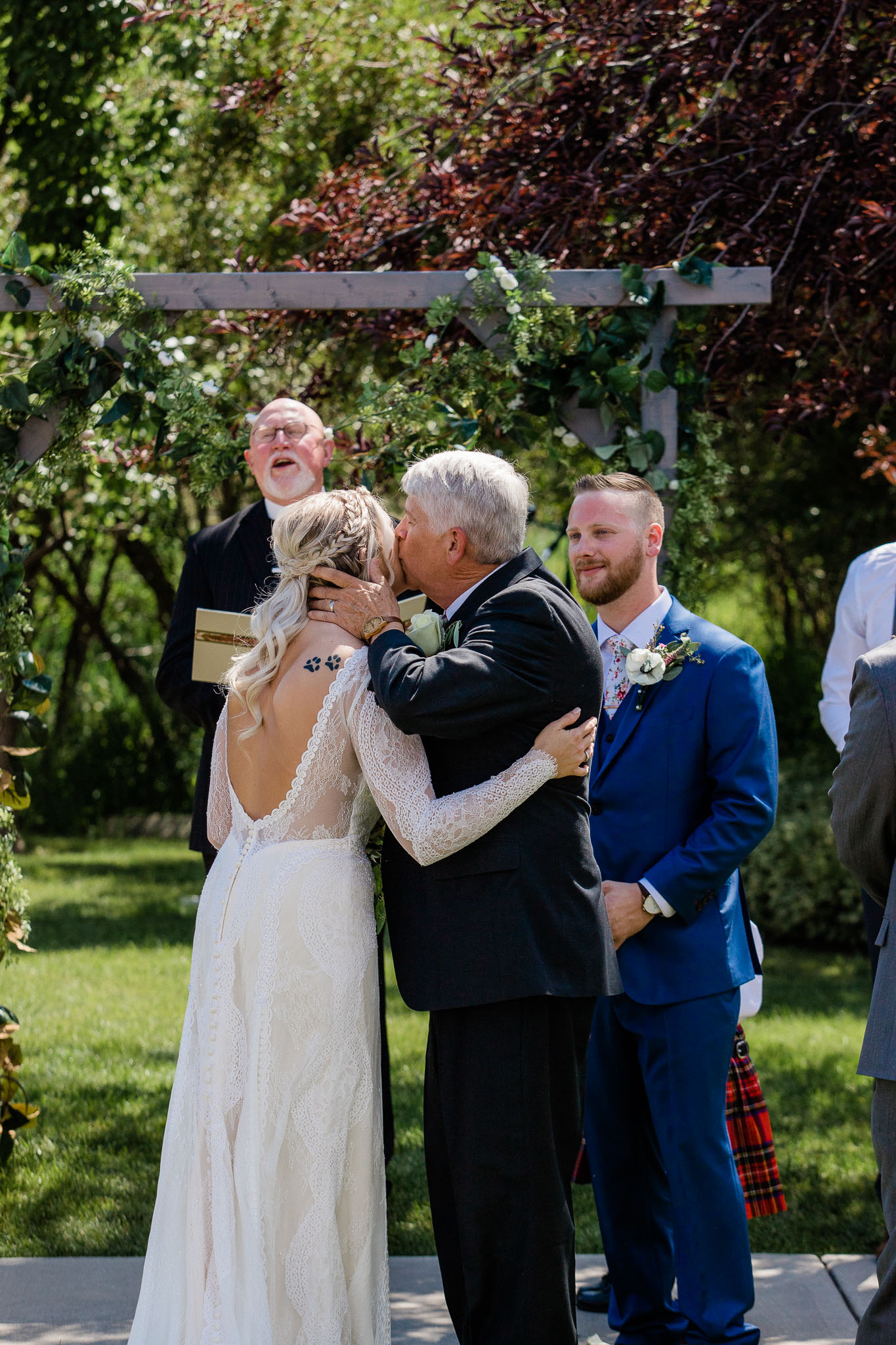 Bride and Groom during wedding ceremony at cabin in Utah Mountains