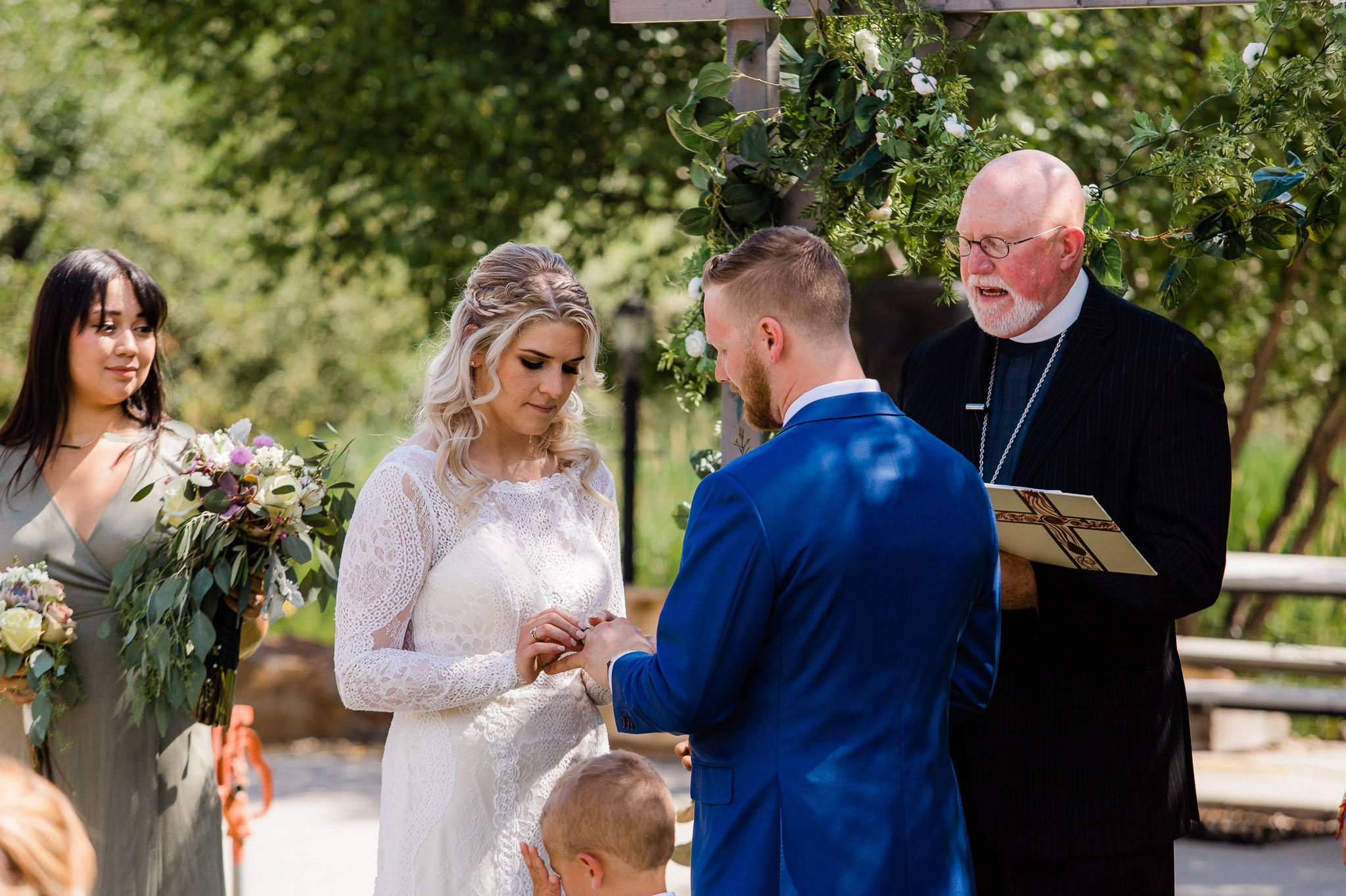 Bride and Groom during wedding ceremony at cabin in Utah Mountains