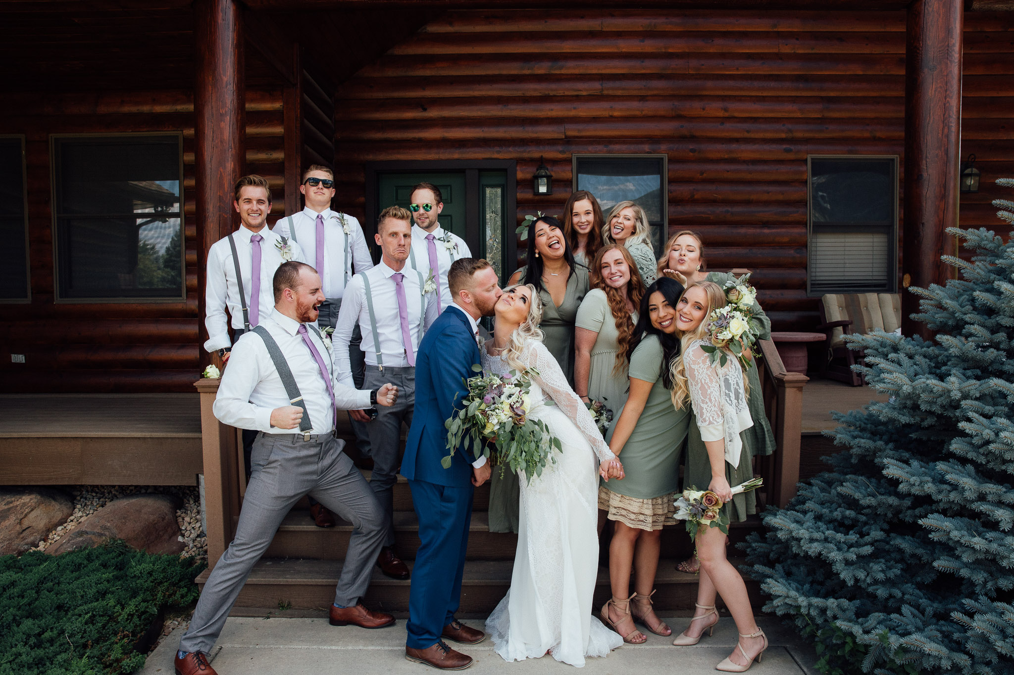 Wedding party poses for silly photo with Bride and groom