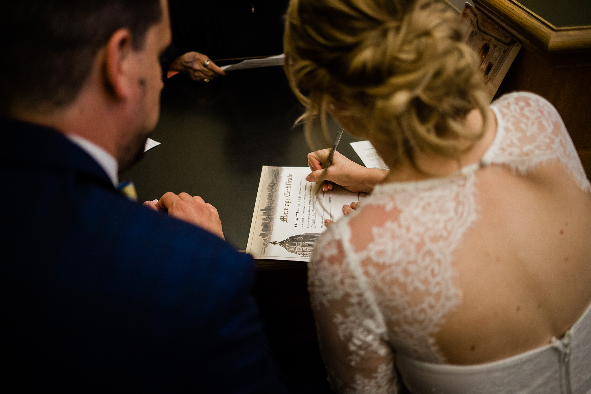 Bride and Groom meet with officiant in San Francisco City Hall