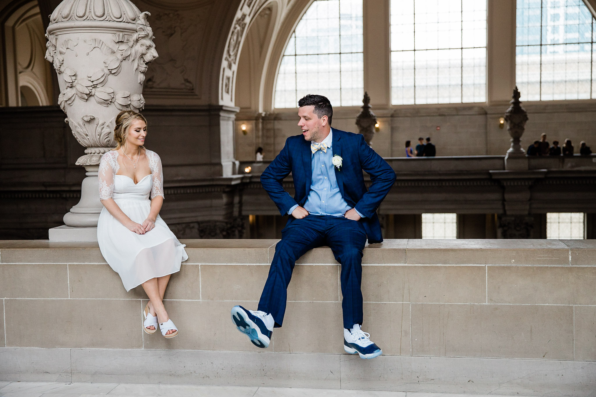 Bride and Groom pose for wedding portraits in San Francisco City Hall