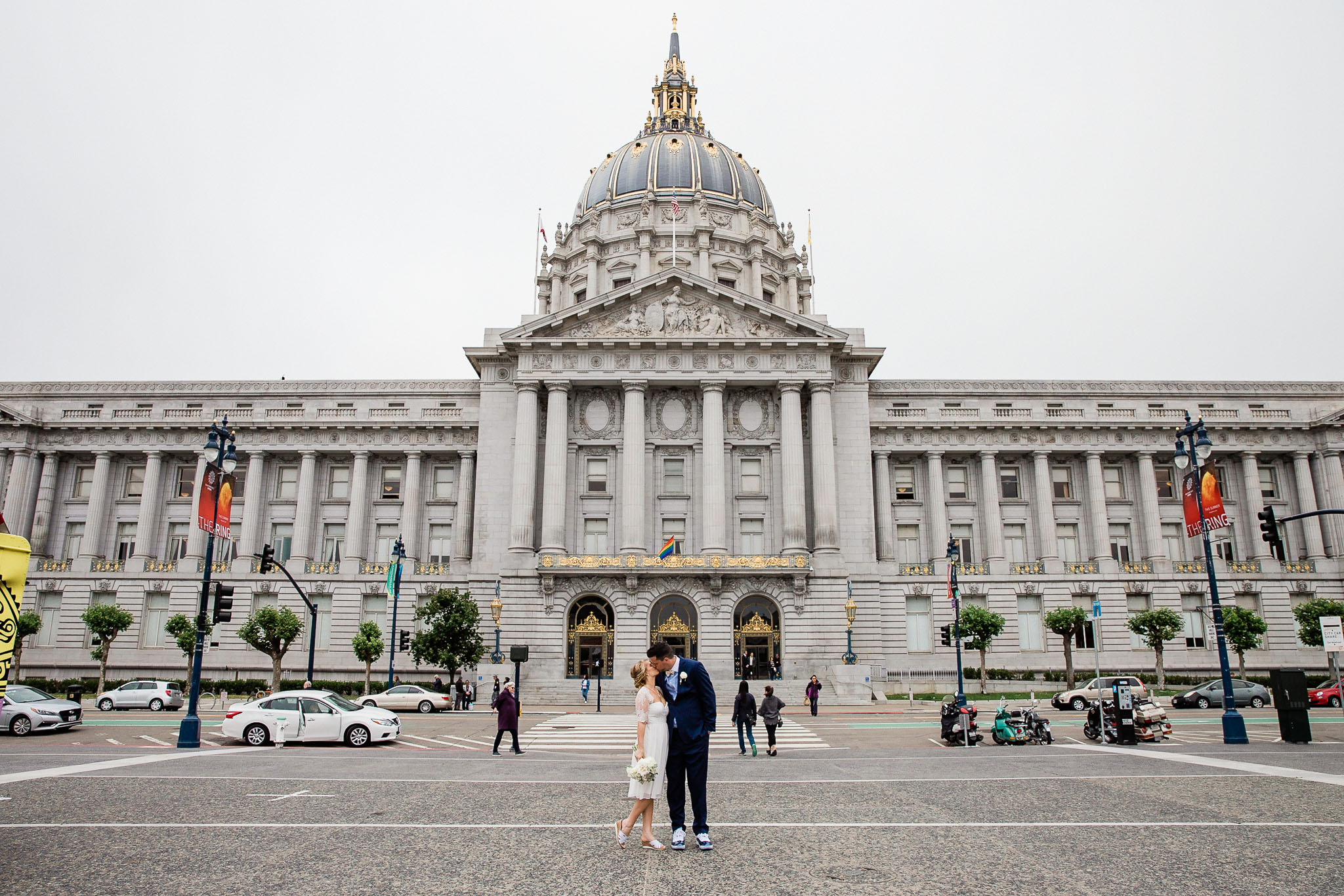 Bride and Groom pose for wedding portraits in San Francisco City Hall