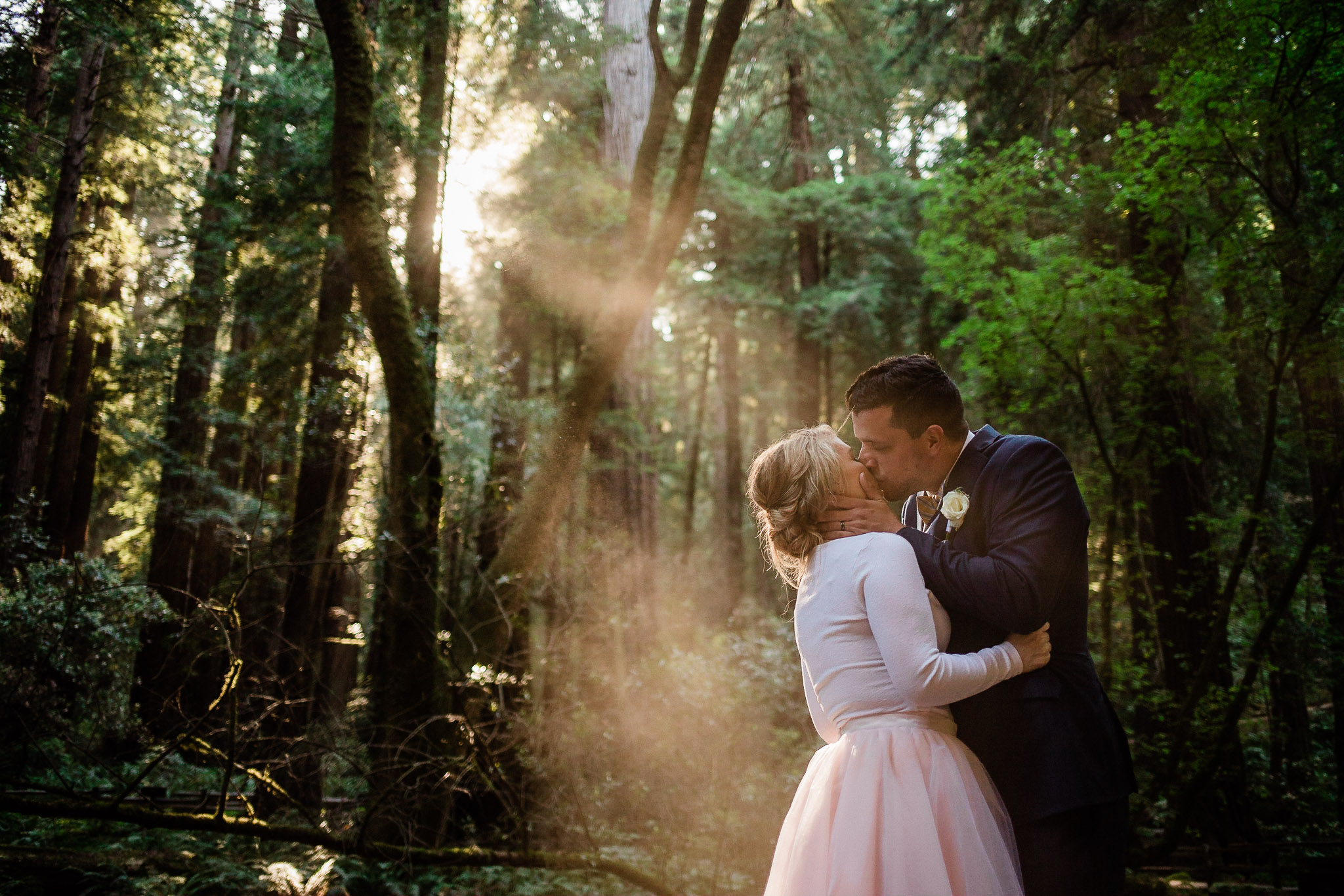 Bride and Groom pose for wedding photos in the Muir Woods National Monument