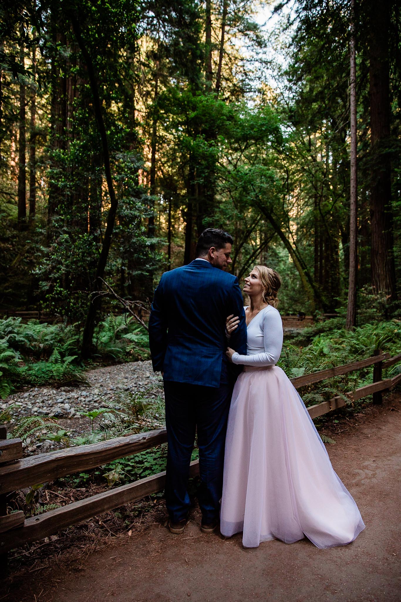 Bride and Groom pose for wedding photos in the Muir Woods National Monument