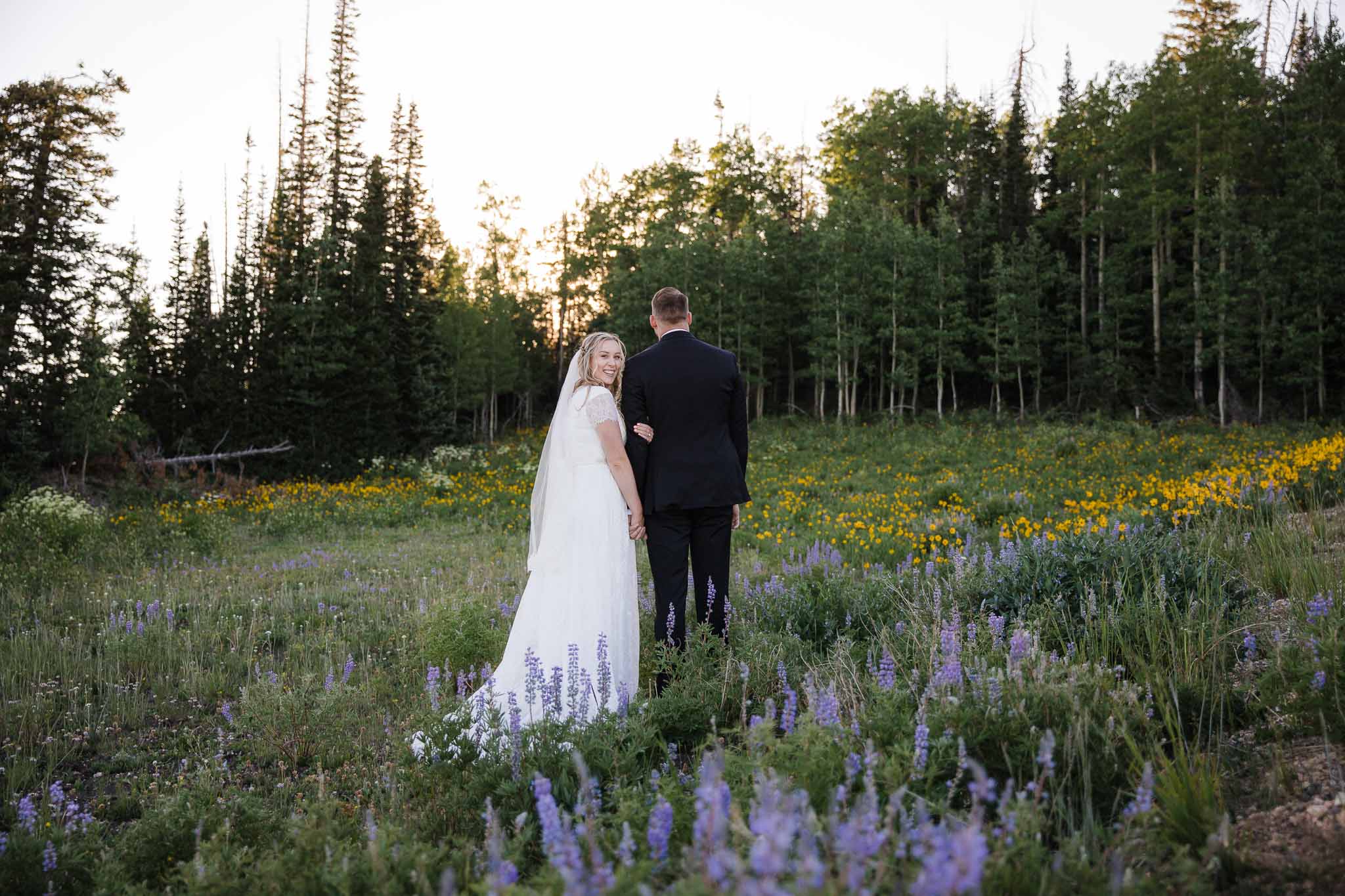 Bride and Groom pose for wedding portraits in Cedar Breaks National Monument