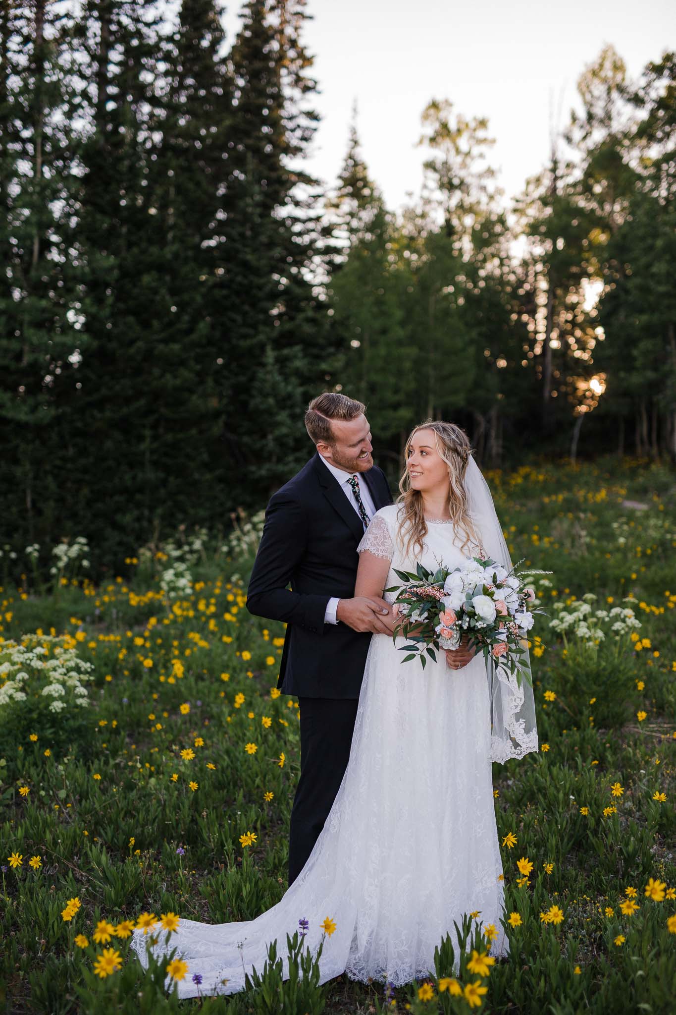 Bride and Groom pose for wedding portraits in Cedar Breaks National Monument