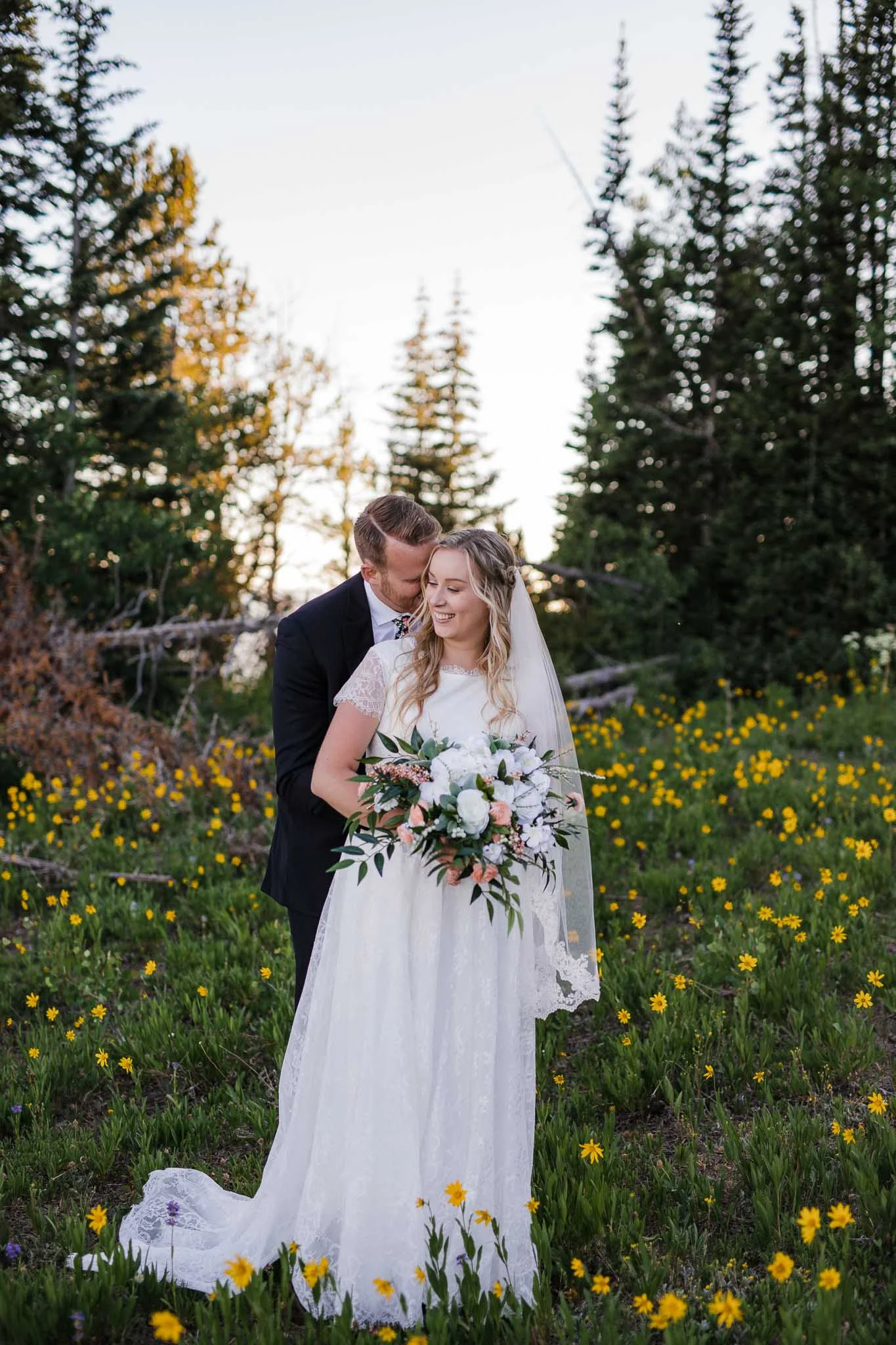 Bride and Groom pose for wedding portraits in Cedar Breaks National Monument