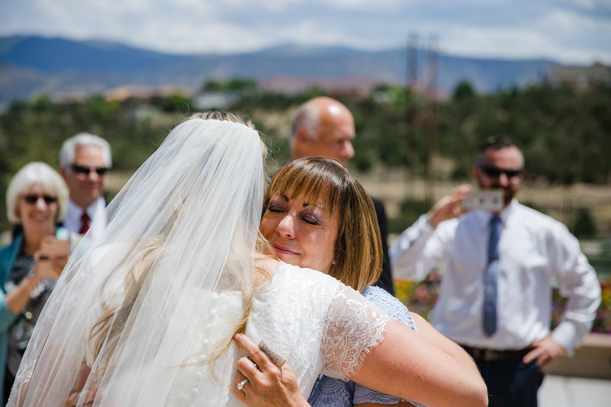 Bride greets guests after Cedar City Temple wedding ceremony