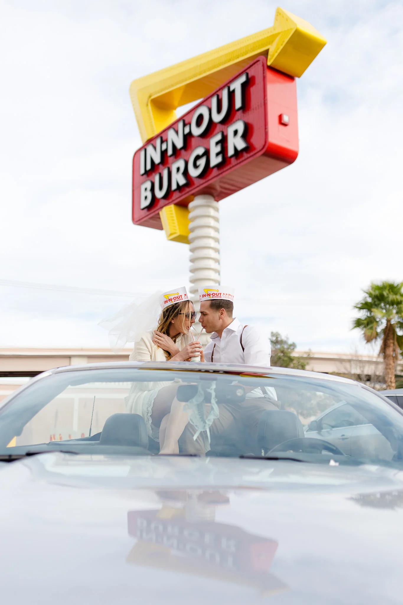 Bride and groom share a wedding shake from In-N-Out during their Las Vegas Elopement