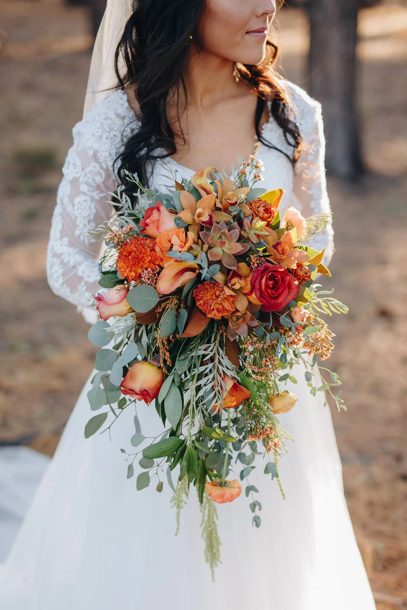 Fall color themed wedding bouquet and bride at Grand Canyon National Park