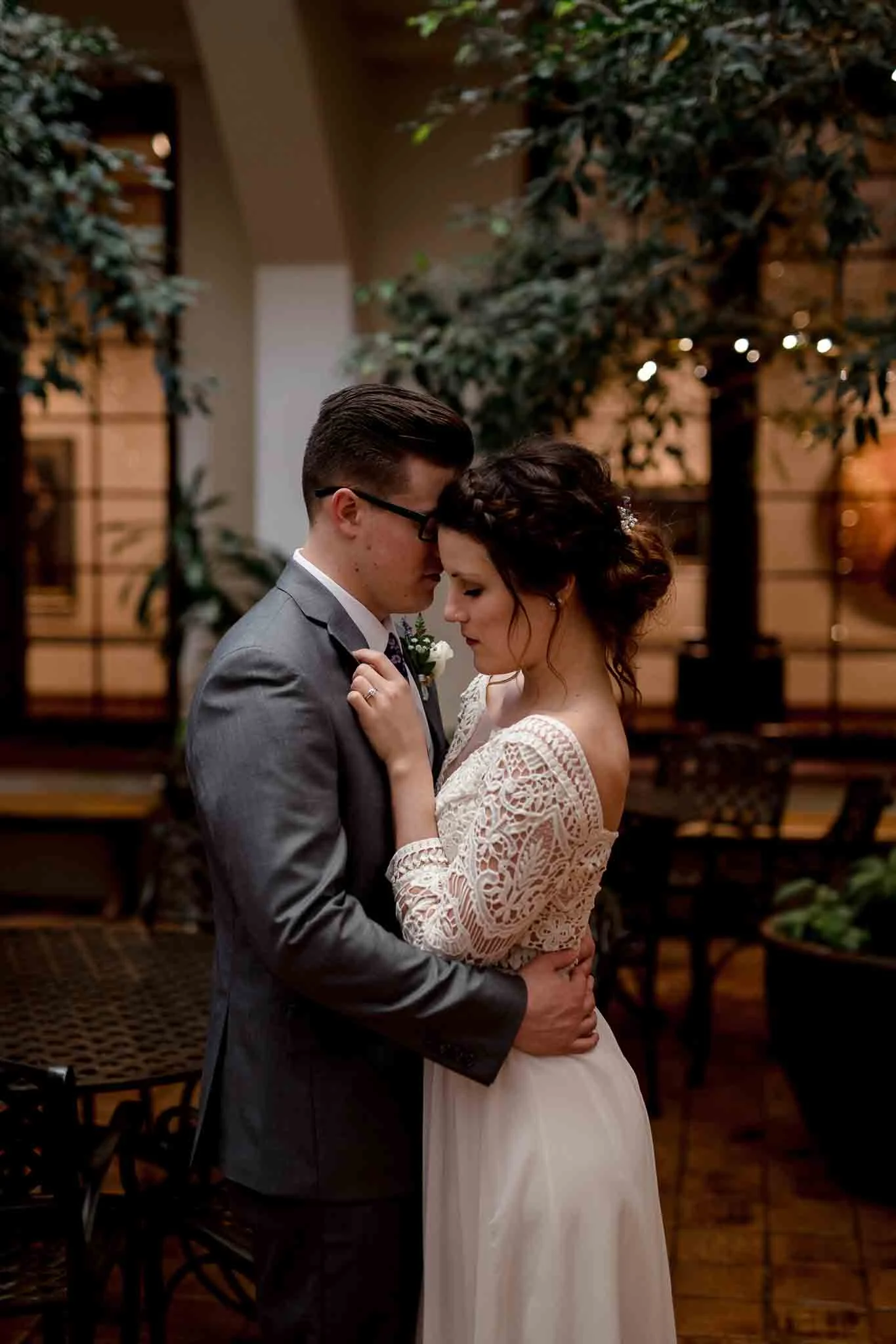 Intimate bride and groom portrait in art museum Springville, Utah