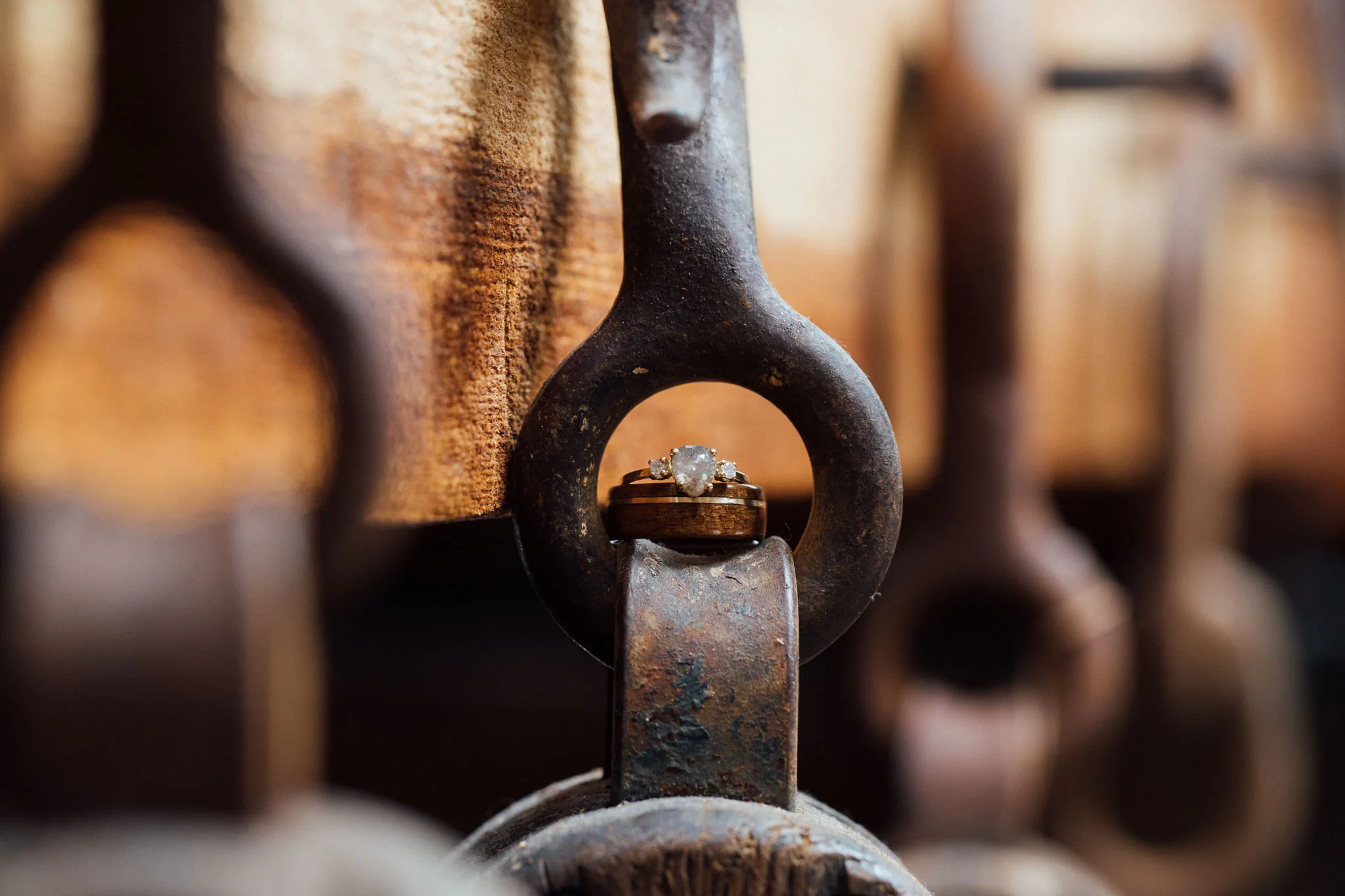 Custom wedding rings on whaling ship hook pulley detail New Bedford Massachusetts
