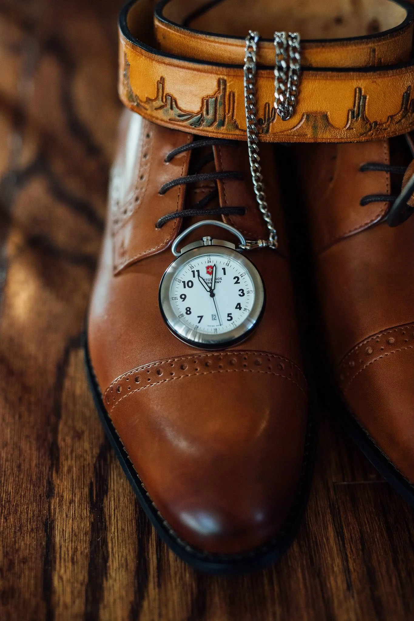 Groom belt pocket watch and shoes Zion National Park wedding details
