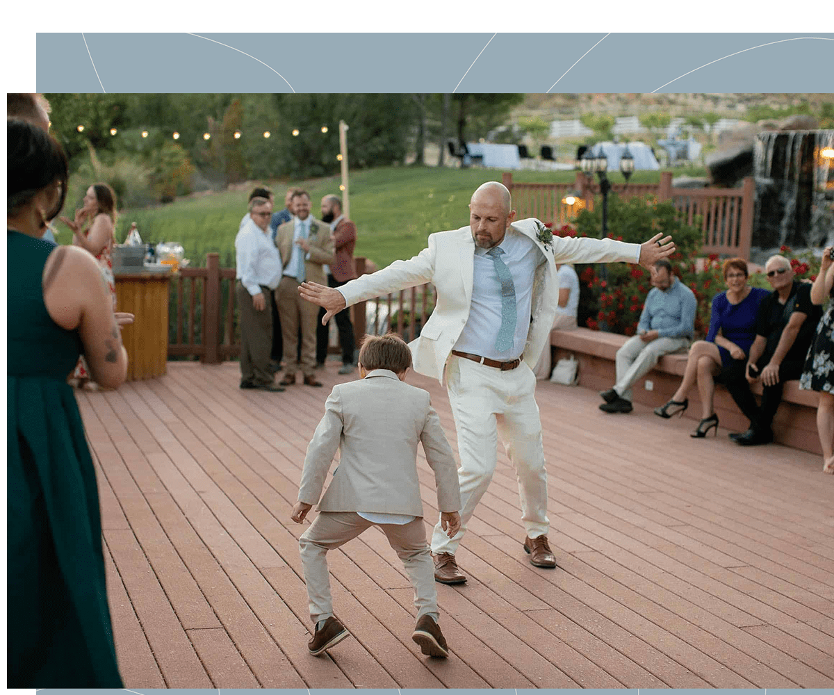 Groom dances with a kid at his gay wedding in Toquerville Utah
