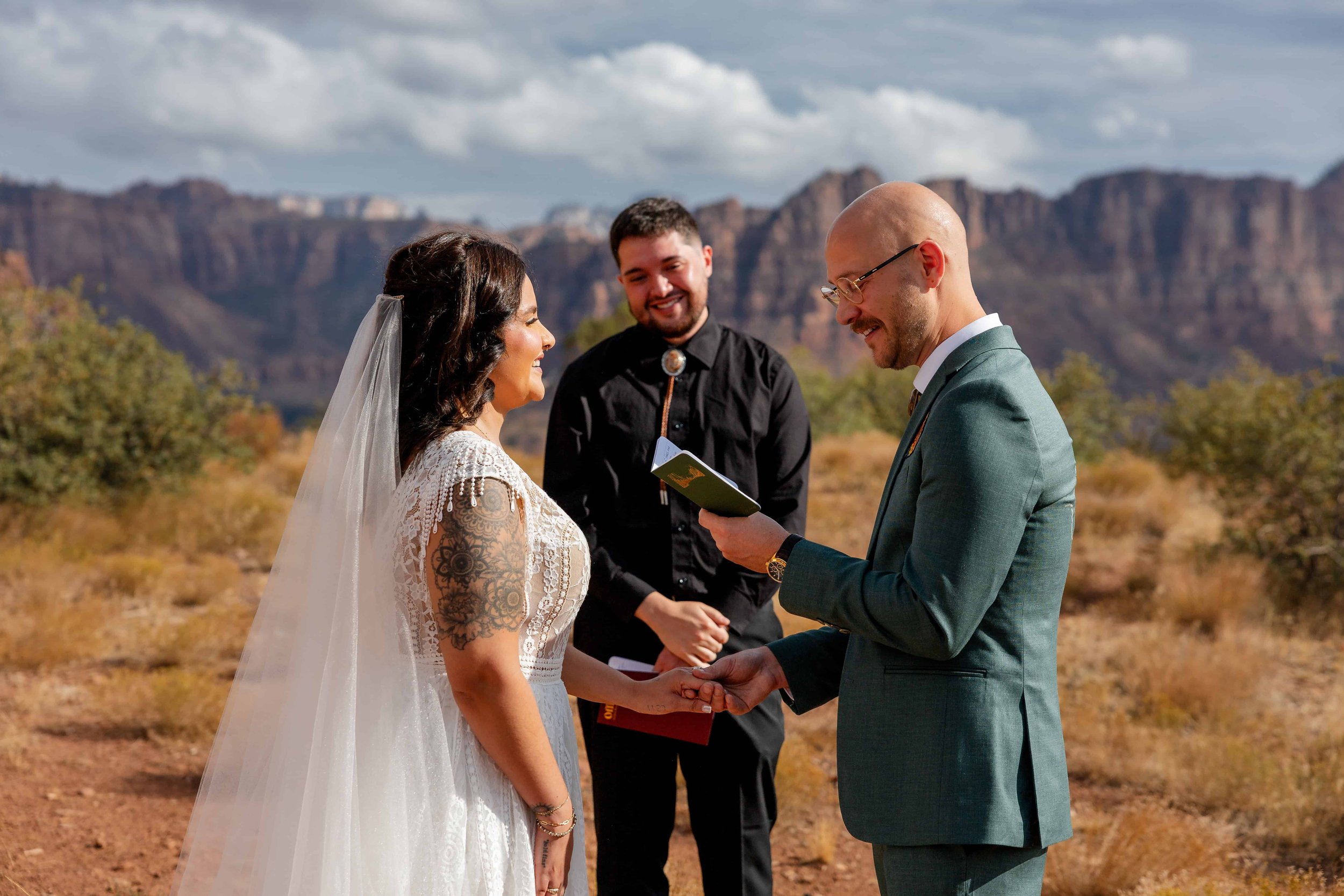 bride and groom share vows during fall zion wedding