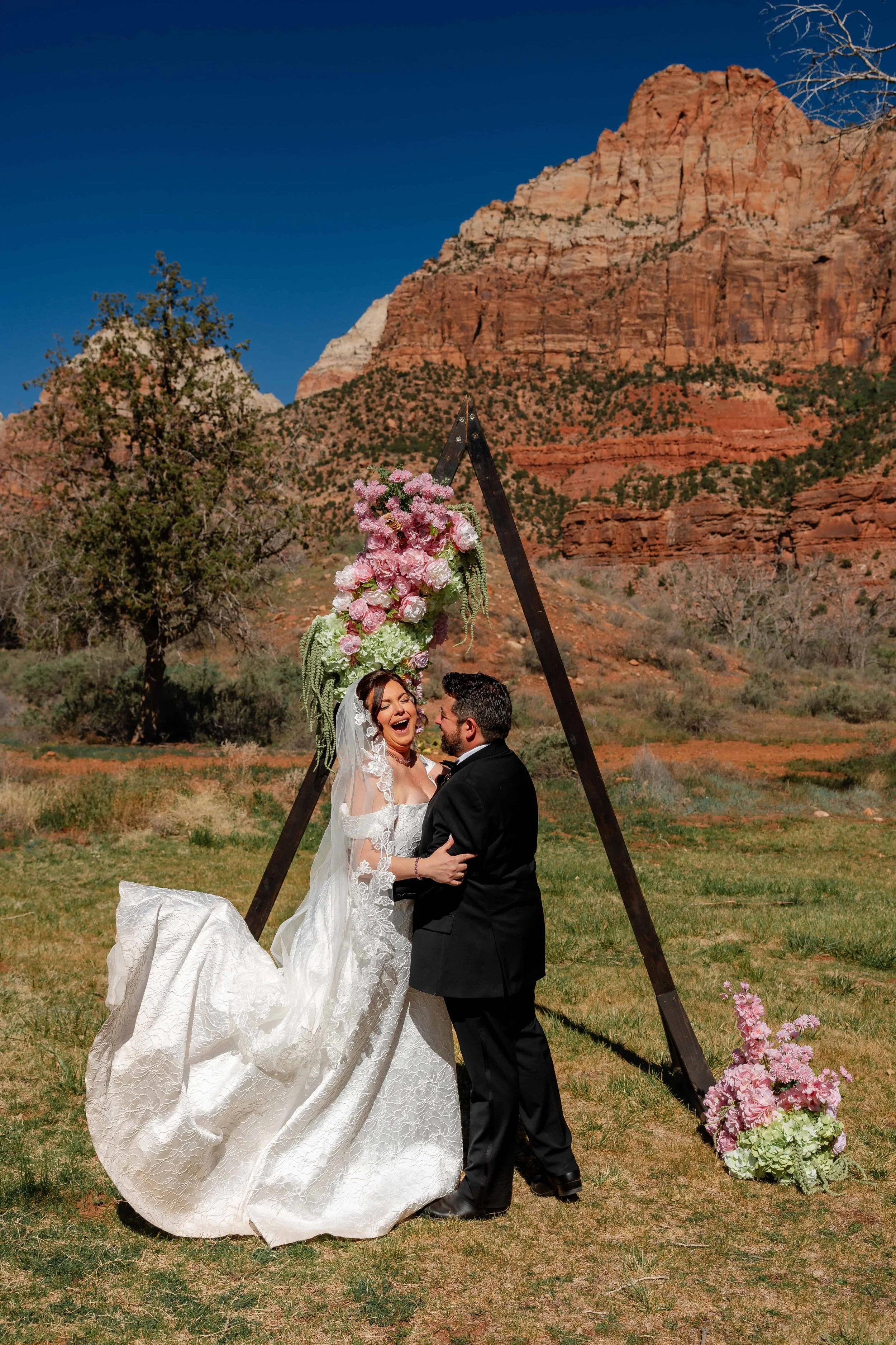 Bride and groom cheer after Nature centure north lawn wedding ceremony