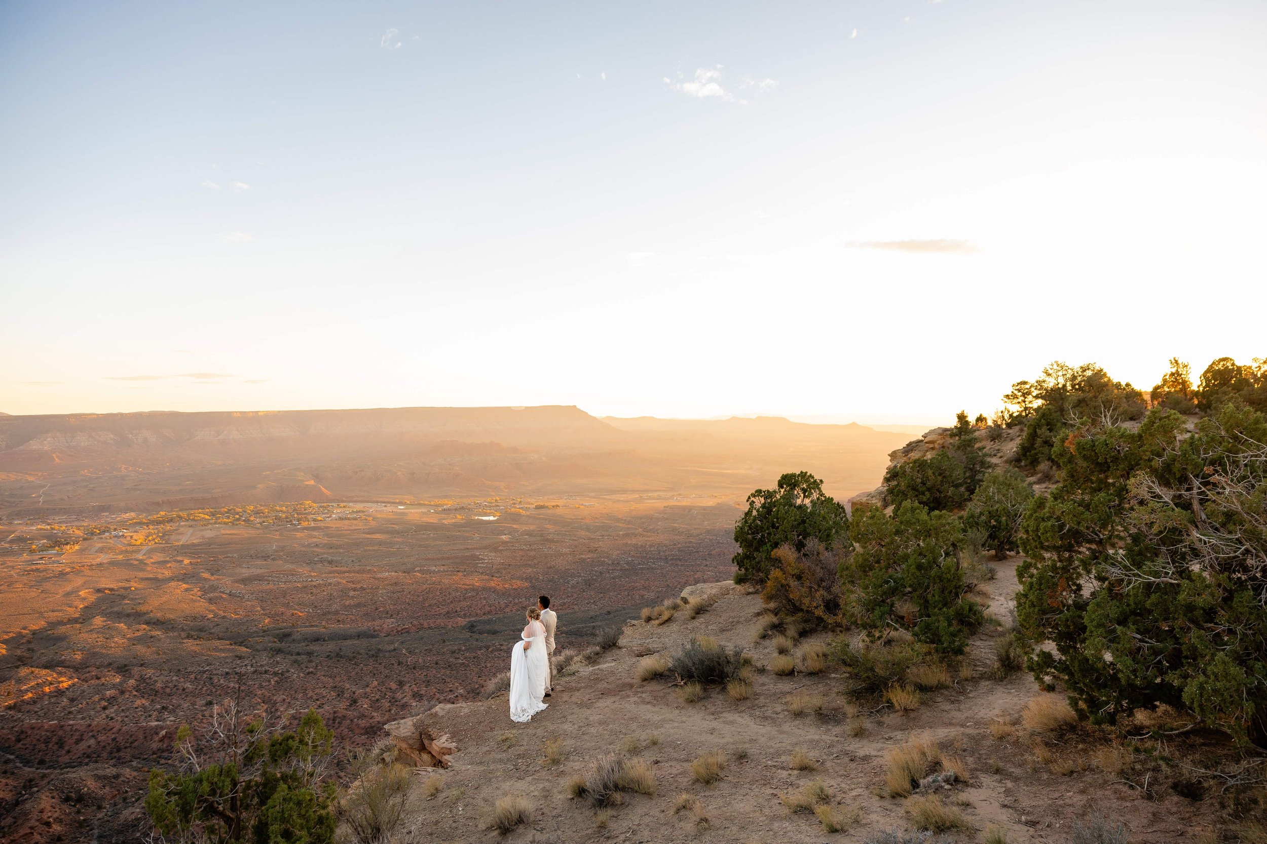 bride and groom pose together during fall zion wedding