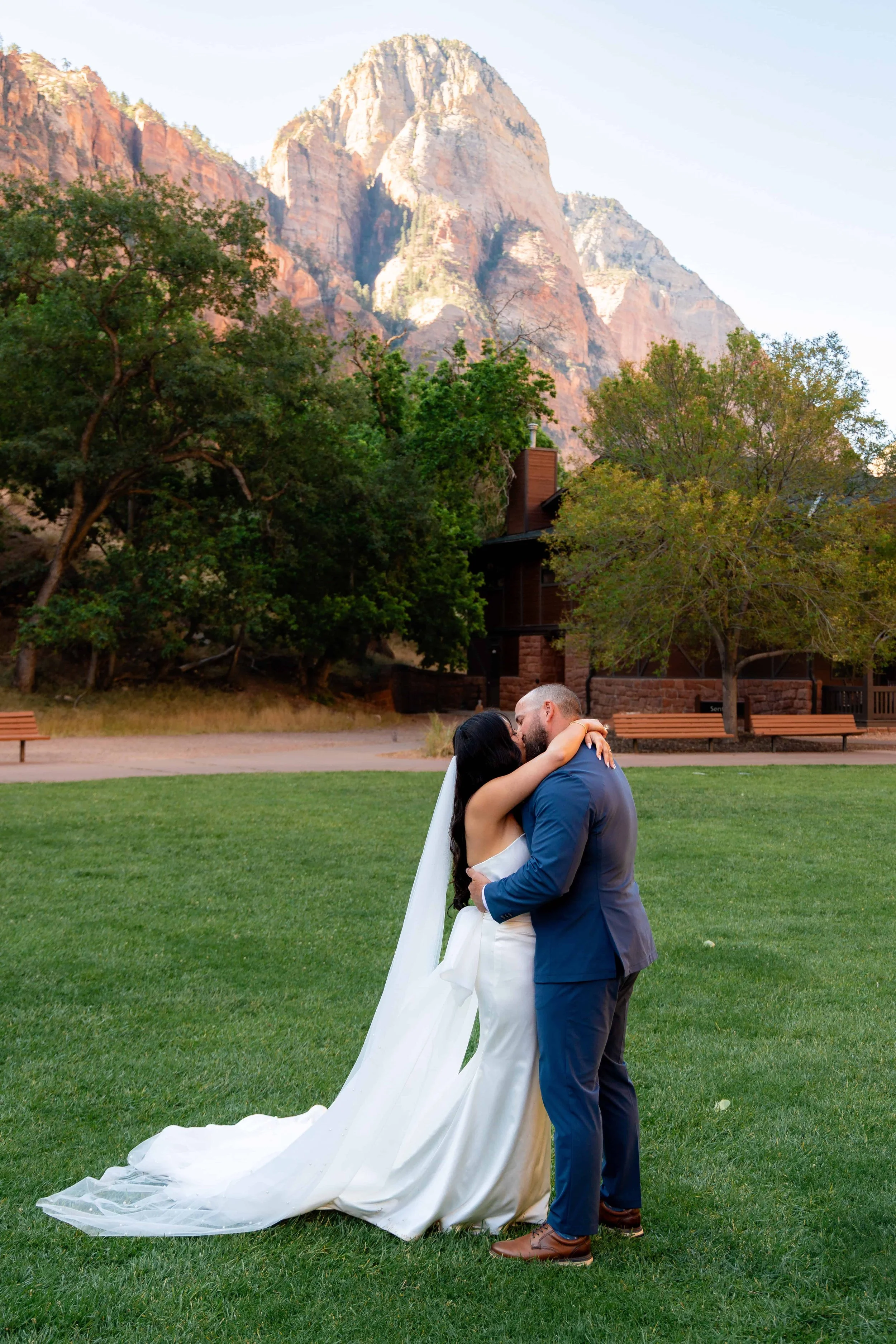 Bride and groom kiss after Zion lodge lawn ceremony