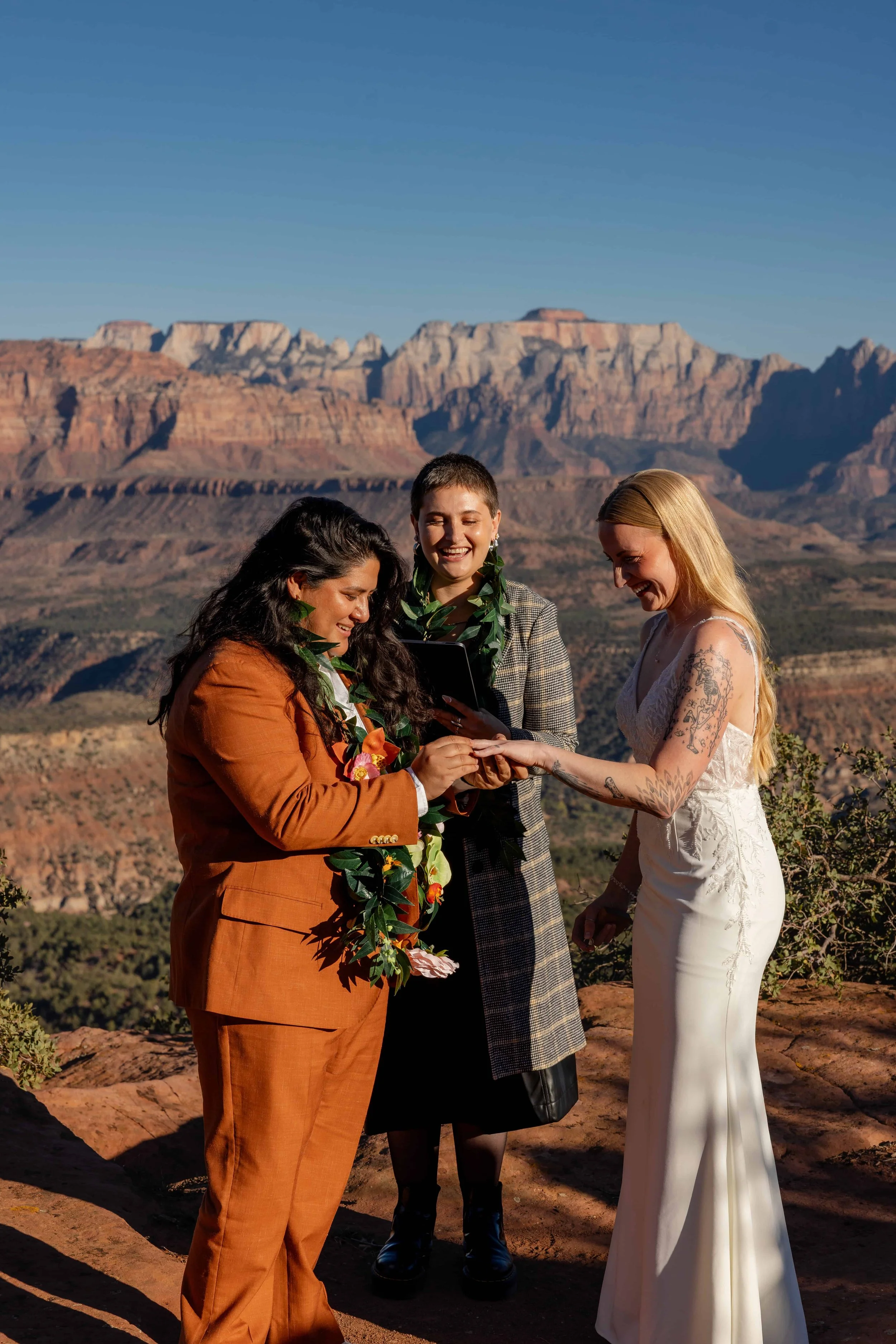 brides exchange rings during zion elopement ceremony