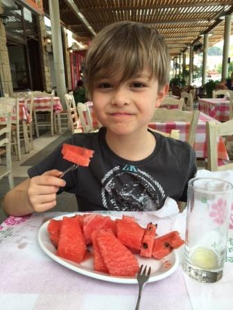 Ned eating karpouzi in Greece