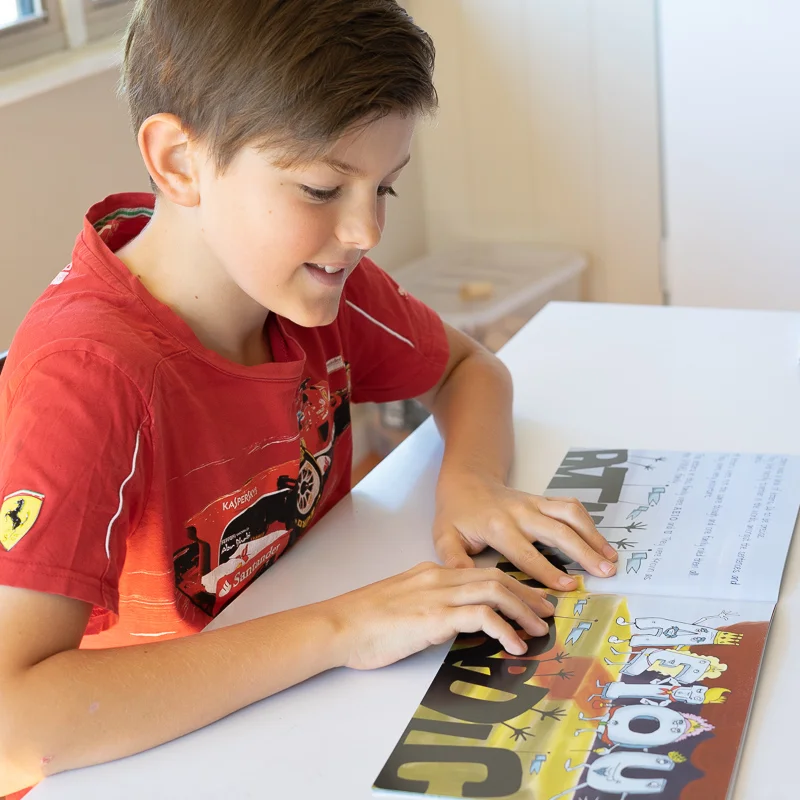 child reading alphabet kingdom