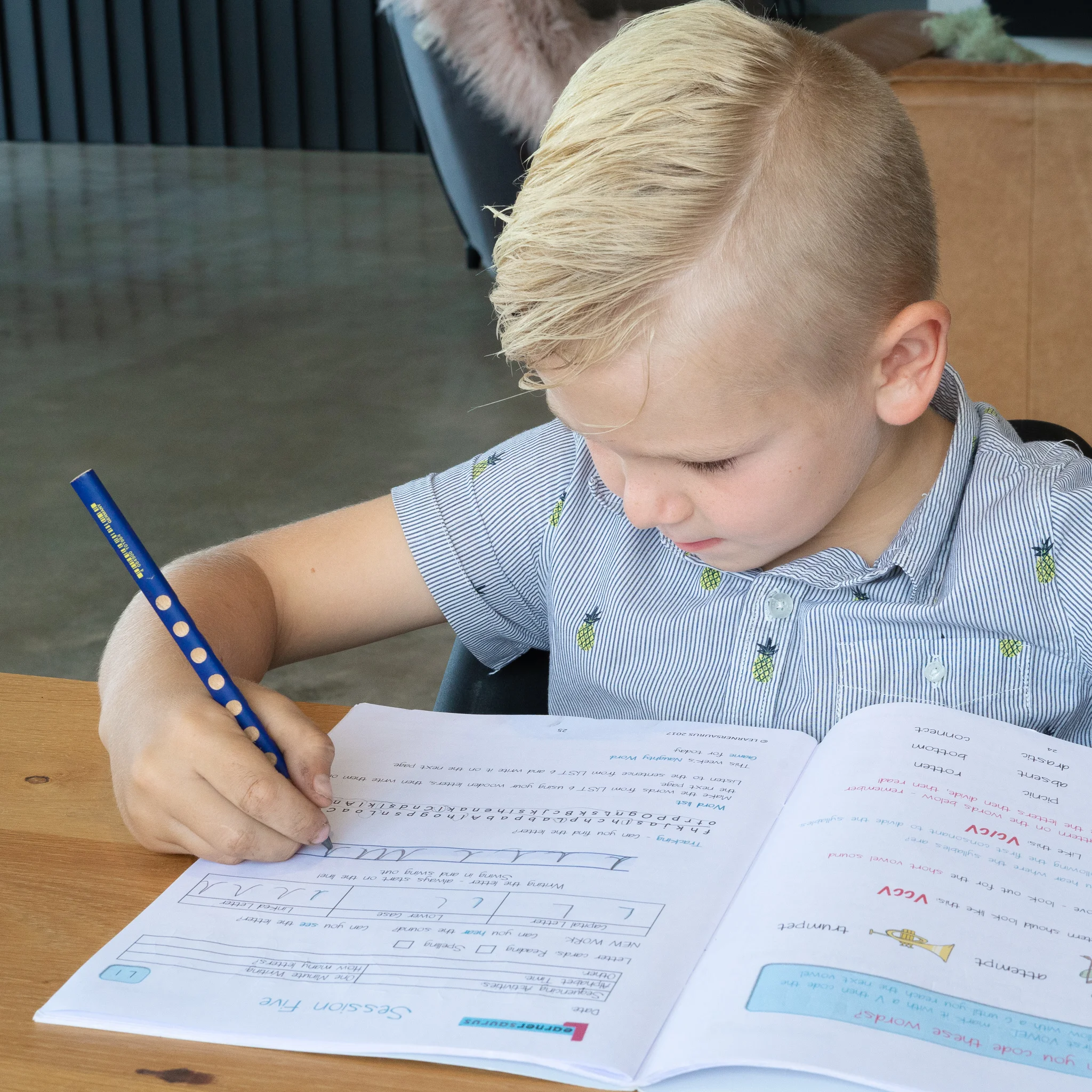 child using groove grip pencil