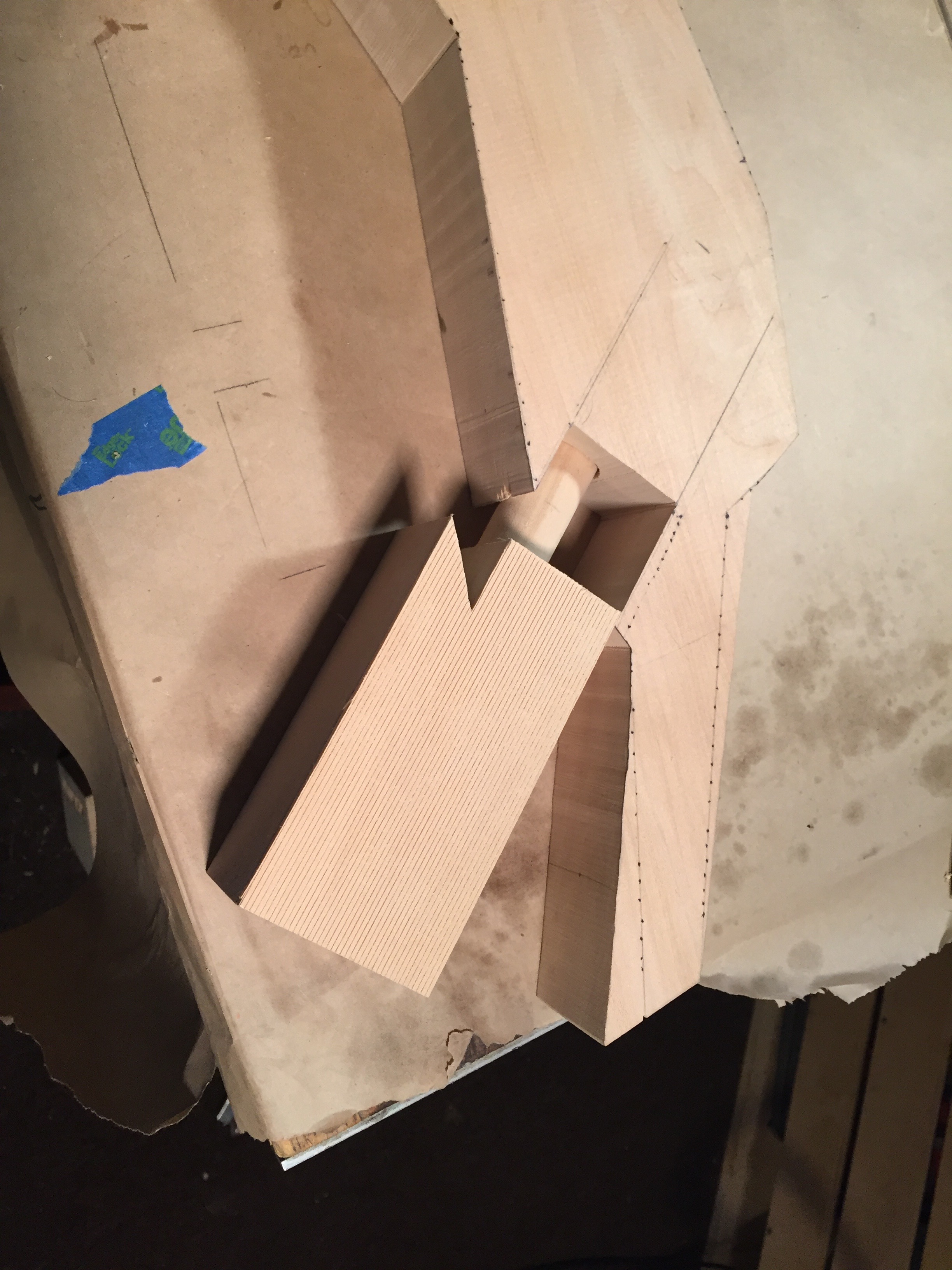 A tenon/dowel is turned on the lower beak, and the head is drilled out to accept it. Within this lower beak and tenon/dowel is a 3/8" hole that runs then length of the lower beak and into the head to accept a stainless steel rod for suspending the skimmer off of what will be the carvings base.