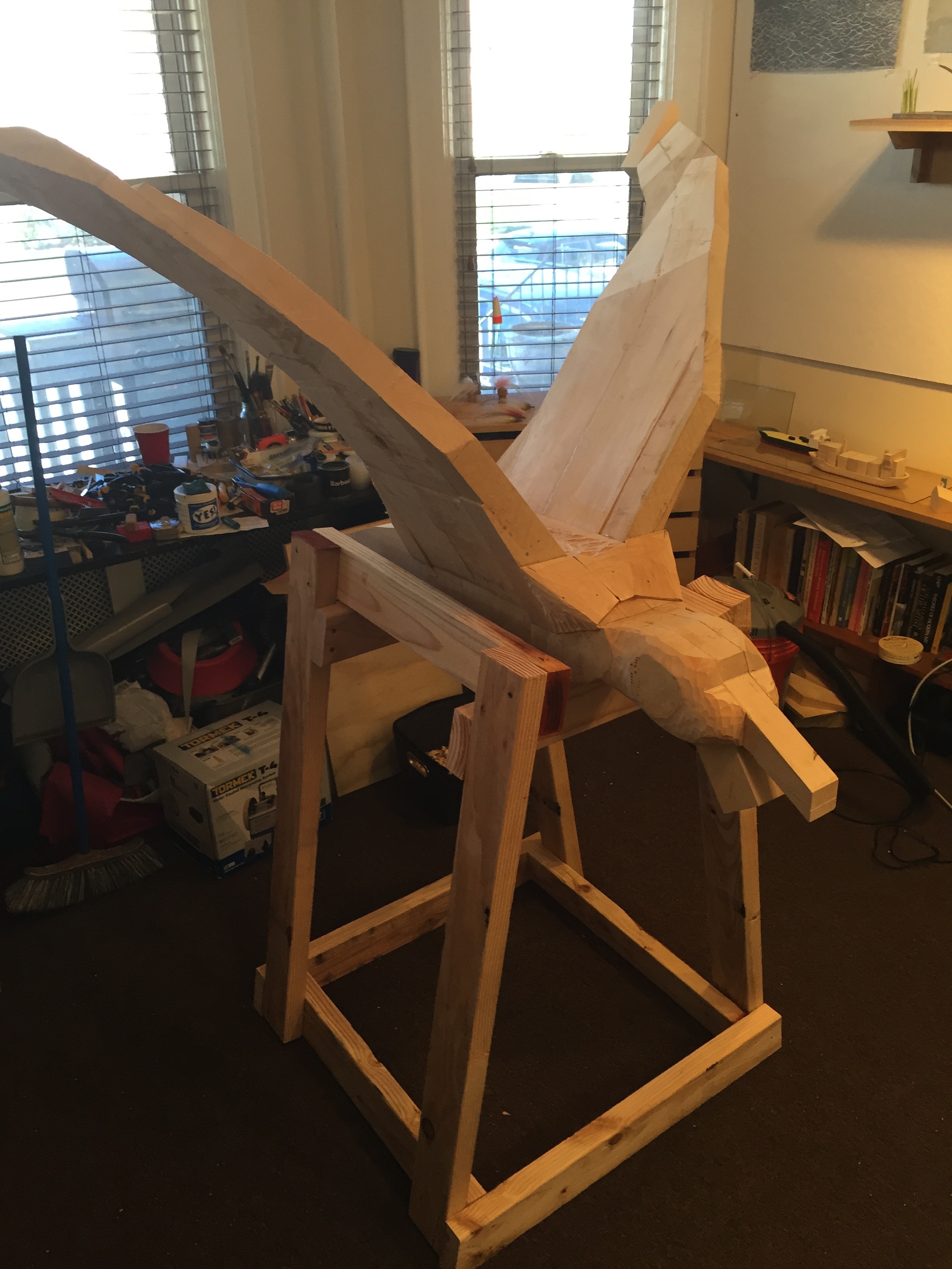 A cradle is built to hold the skimmer so that carving can begin.