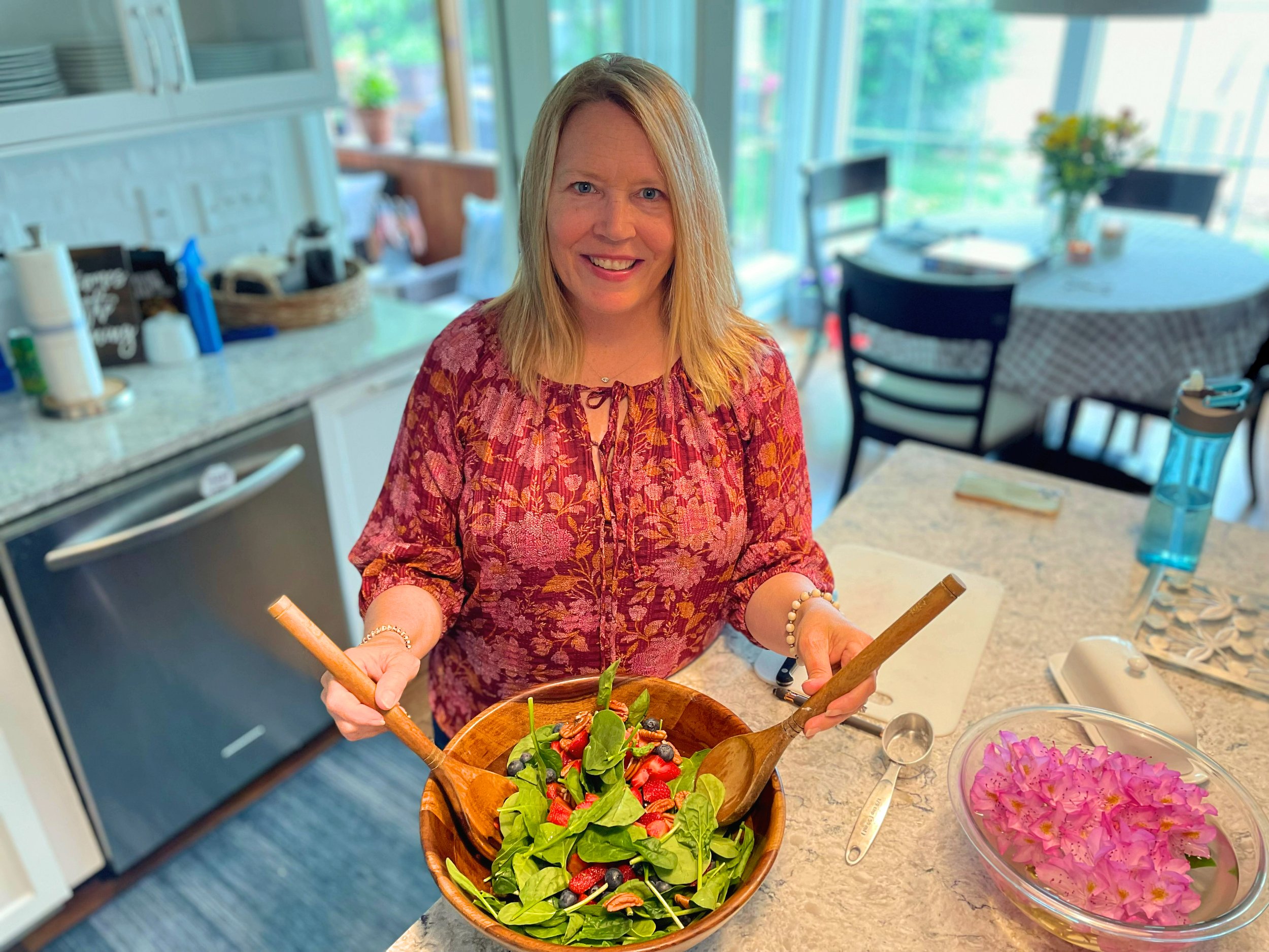 Stephanie enjoying meal preparation in her kitchen.