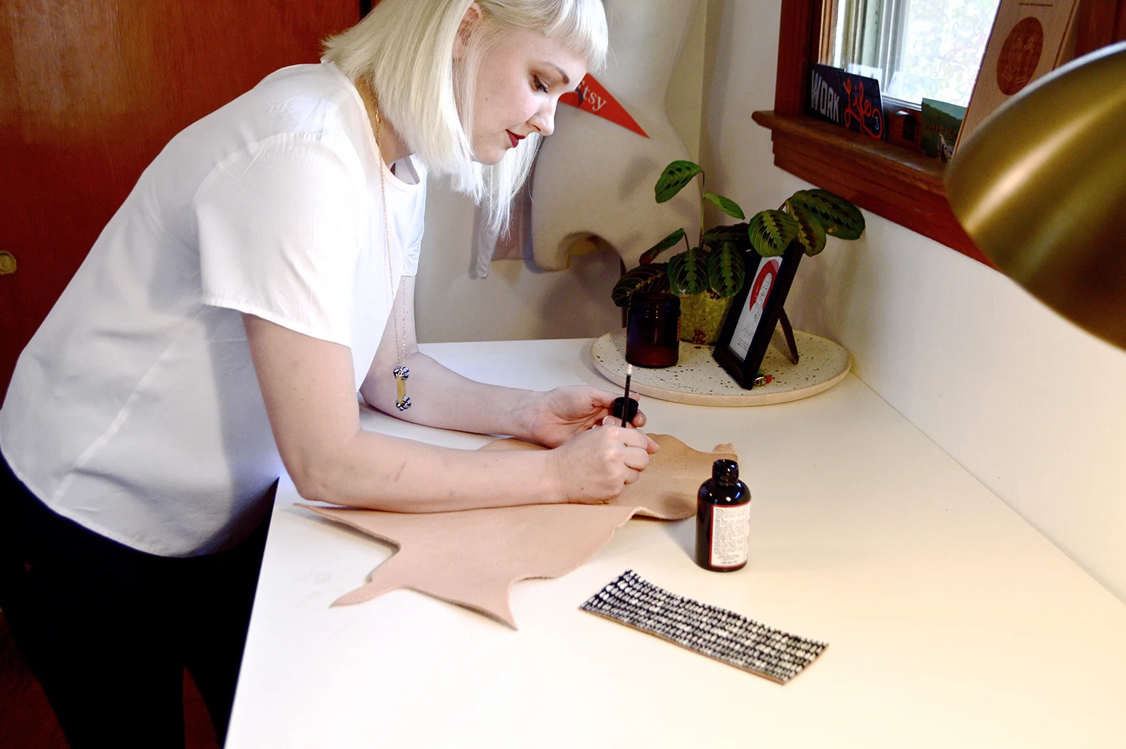 Local maker and owner of Cold Gold, Alaina Smith at her workstation. 