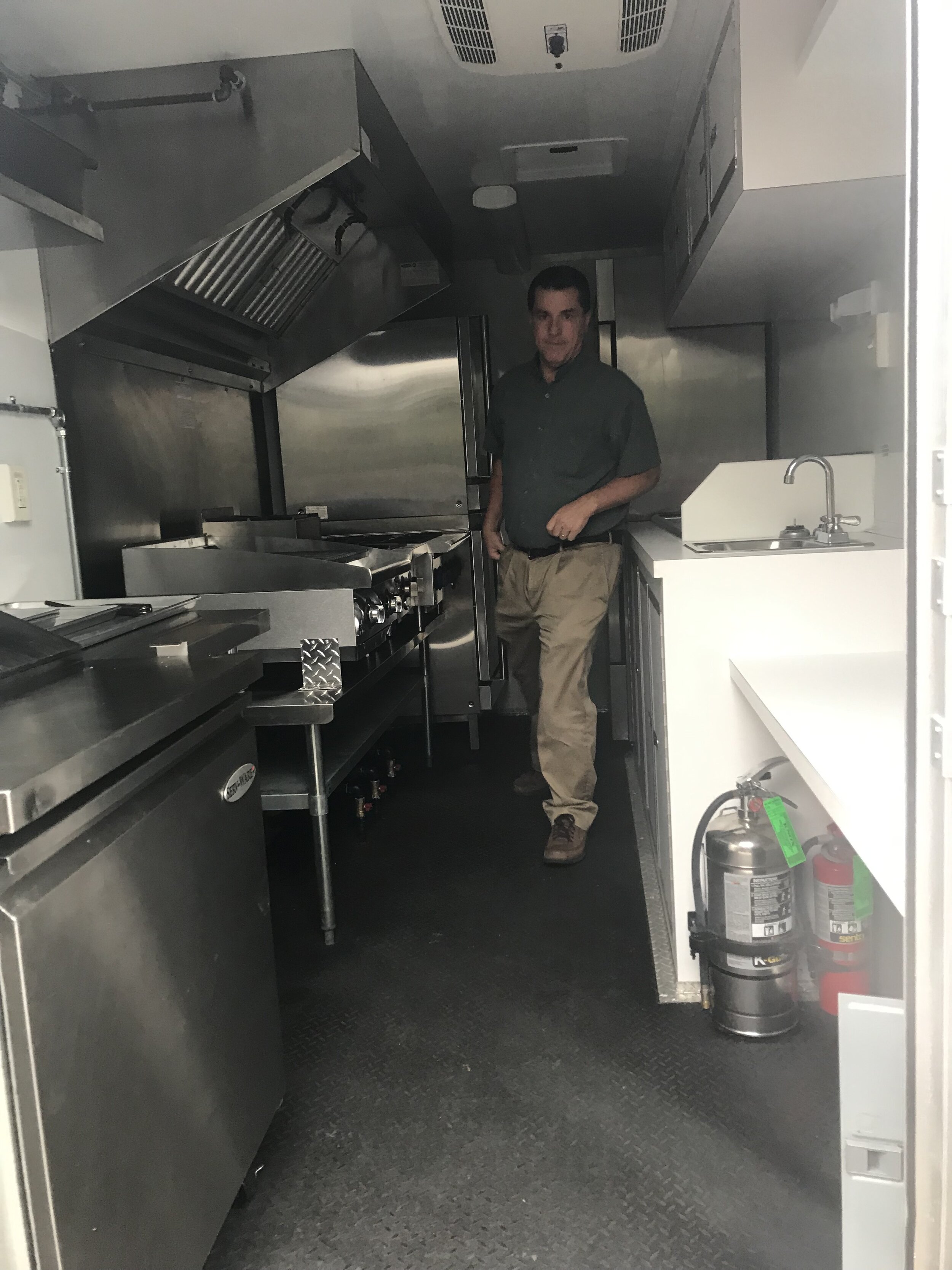  Dale Akins inside the Mobile Commercial Kitchen. 
