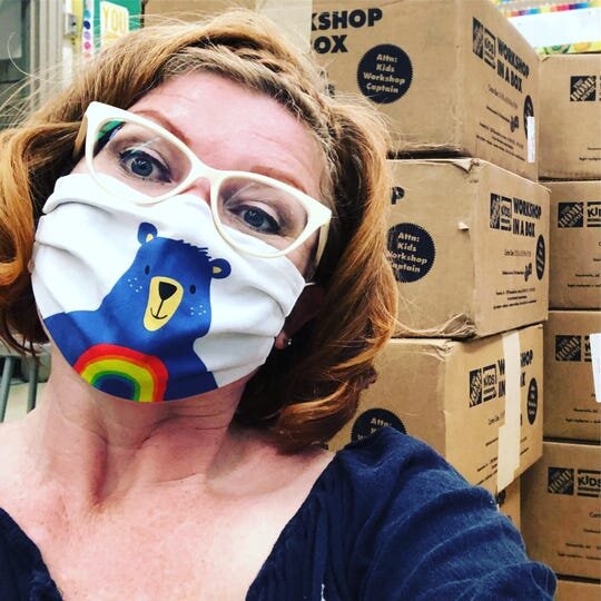 Beaumont Magnet Academy visual arts teacher Cheryl Burchett in one of the countless masks she’s made since spring. This design is specifically for the Beaumont faculty.&nbsp;(Photo: Submitted by Cheryl Burchett)