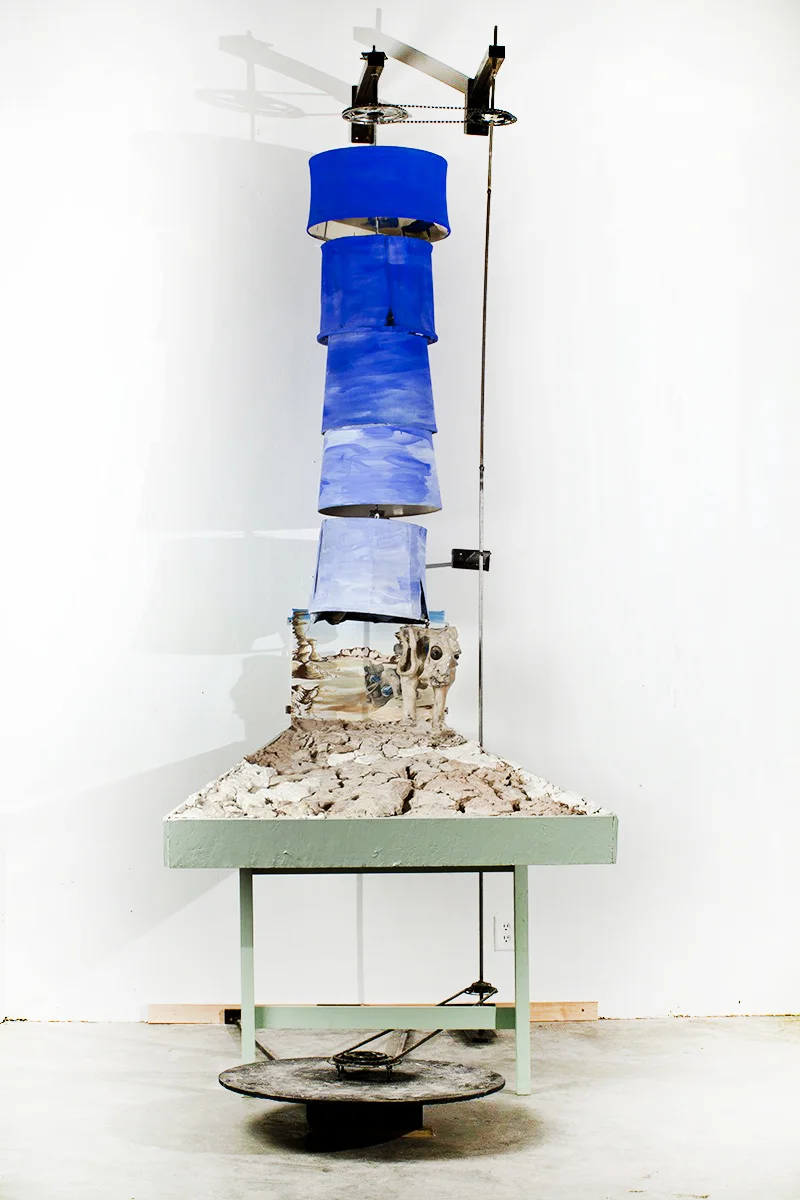 Atmosphere Mixed Media. Viewer can push on a wheel with their foot which will turn the skyscape and make the creature kick up dirt.