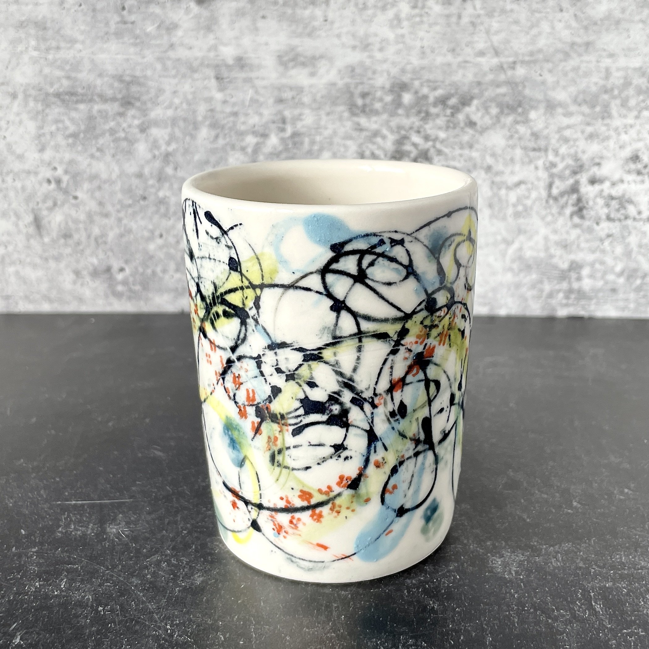 Translucent Porcelain Cup with Fun Graphic Design
